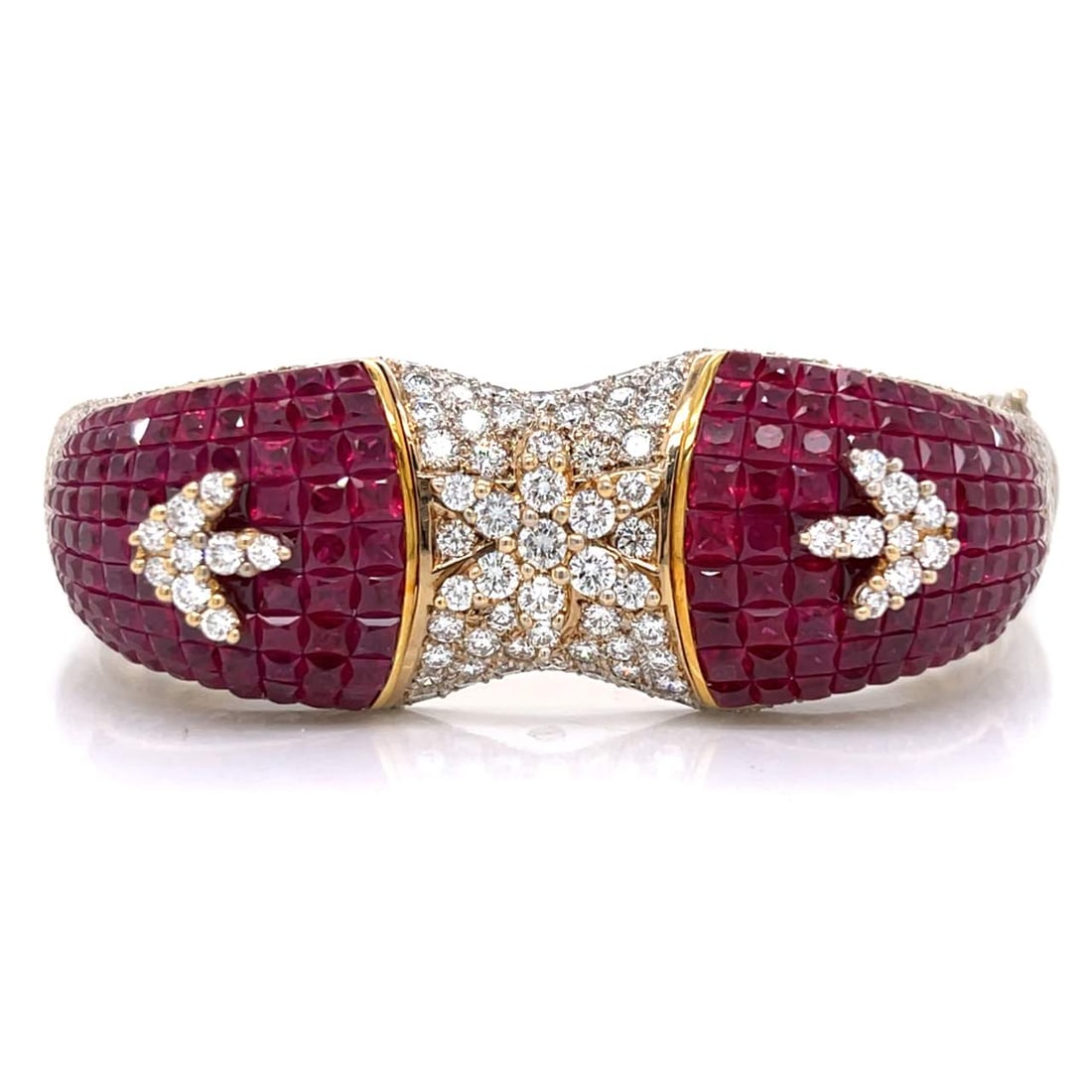 18K Gold Diamond Ruby Bangle Bracelet 237 Diamonds 234 Rubies: 18K Gold Diamond Ruby Bangle Bracelet 237 Diamonds 234 Rubies This exquisite 18K Yellow and White Gold Bangle Bracelet showcases a stunning combination of 237 diamonds and 234 rubies, making it a trul
