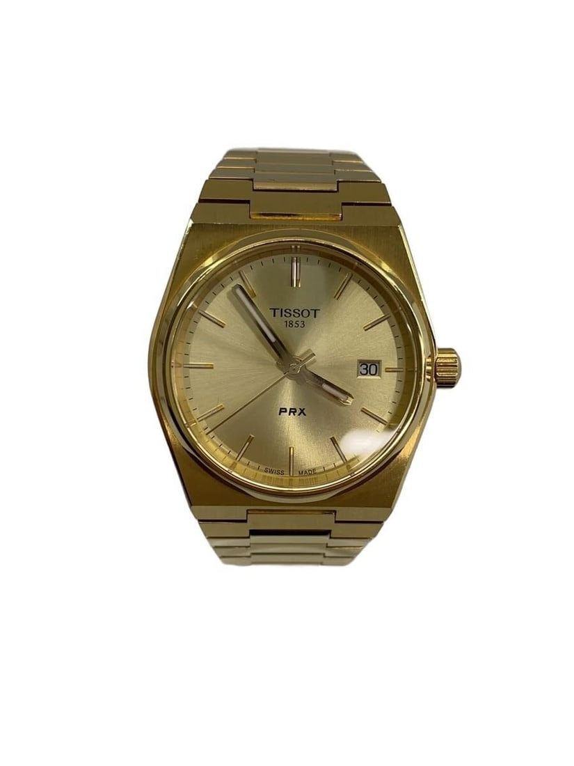 Tissot PRX Quartz Men's Wristwatch T137210A: Tissot PRX Quartz Men's Wristwatch T137210A This TISSOT PRX Quartz T137210A wristwatch is designed for men and crafted in Switzerland. It features a quartz movement and exhibits slight signs of use. T