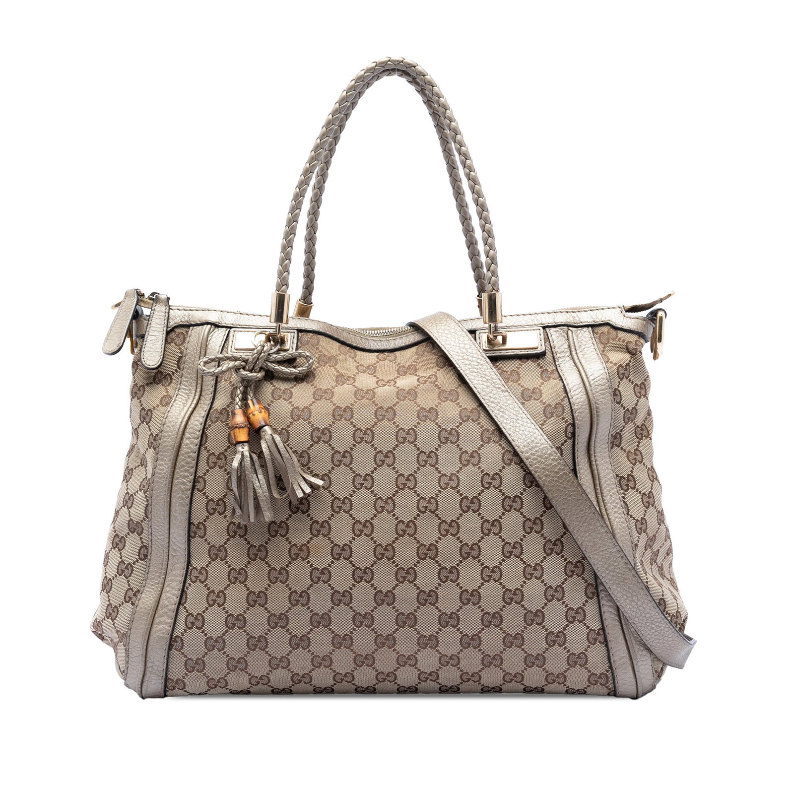 Gucci Bella Tote GG Canvas Convertible Bag with Braided Leather Handles: Gucci Bella Tote GG Canvas Convertible Bag with Braided Leather Handles The Gucci GG Canvas Bella Convertible Tote features a canvas body with leather trim, braided leather handles, a top zip closure,