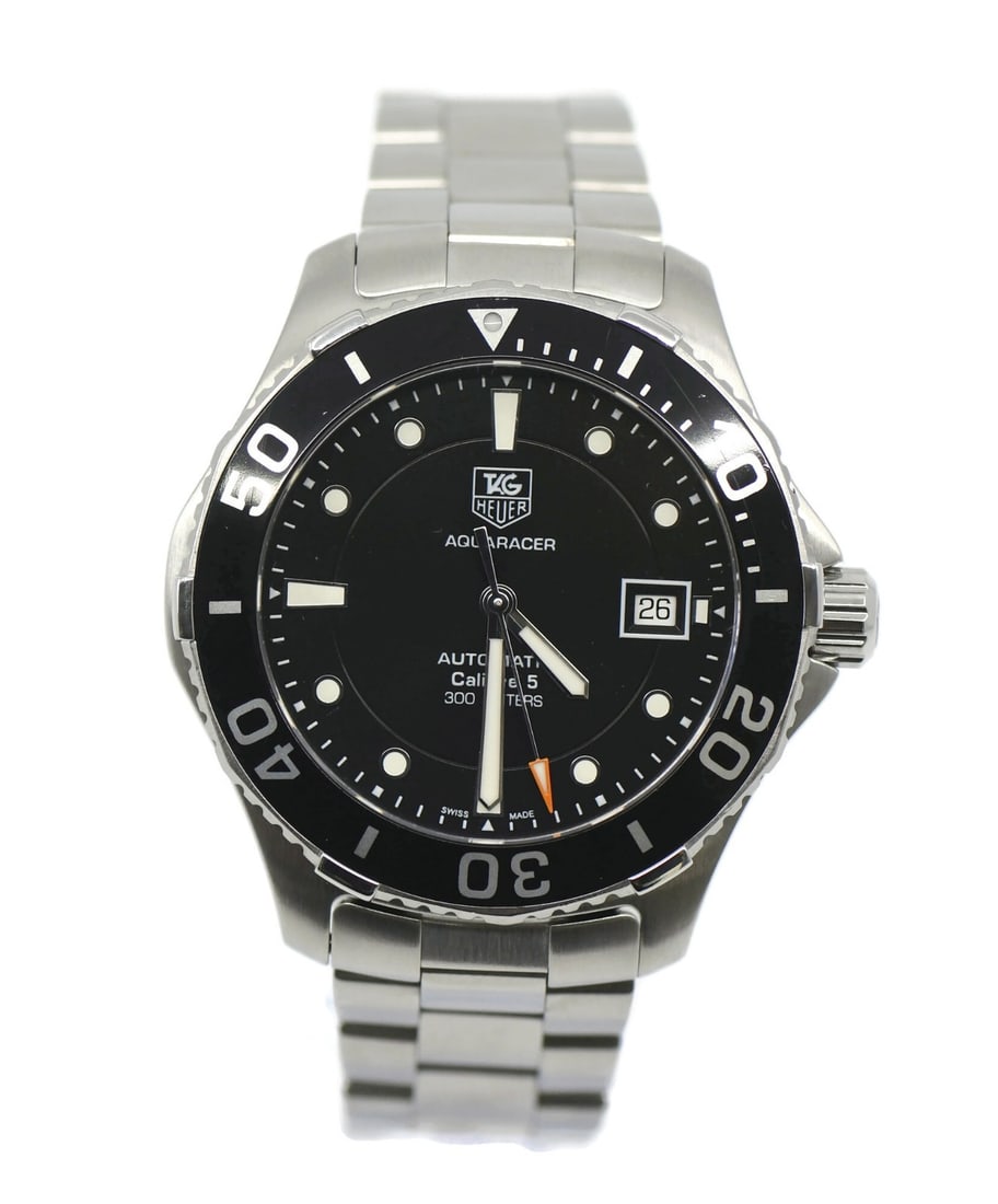 Men's Aquaracer WAN2110 Swiss Stainless Steel Analog Watch with Box and Papers: Men's Aquaracer WAN2110 Swiss Stainless Steel Analog Watch with Box and Papers This TAG Heuer Aquaracer wristwatch features a stainless steel case and band, paired with a black analog dial. Designed f