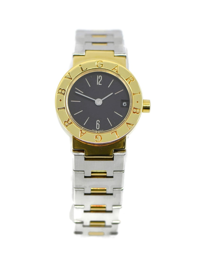 Bvlgari Bvlgari BB23GSD 18K Gold and Steel Quartz Wristwatch Black Dial: Bvlgari Bvlgari BB23GSD 18K Gold and Steel Quartz Wristwatch Black Dial This Bvlgari Bvlgari wristwatch features a 23mm case crafted from yellow gold and a stainless steel band. The watch operates wit