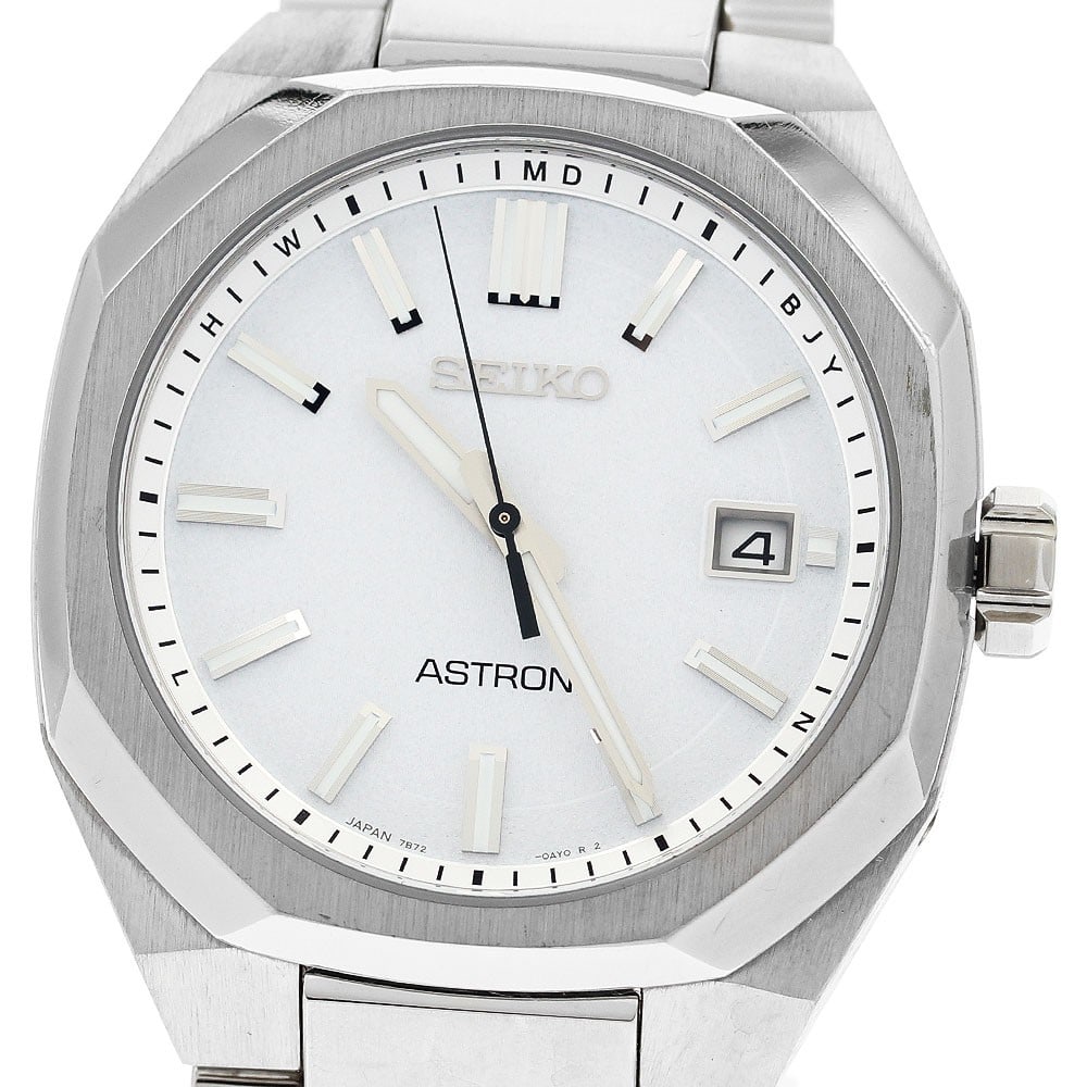 SEIKO Astron Nextar Titanium Solar Radio Controlled Date Watch: SEIKO Astron Nextar Titanium Solar Radio Controlled Date Watch This SEIKO Astron Nextar Date men's wristwatch features a titanium case and band with a white dial. The watch is powered by a solar radio