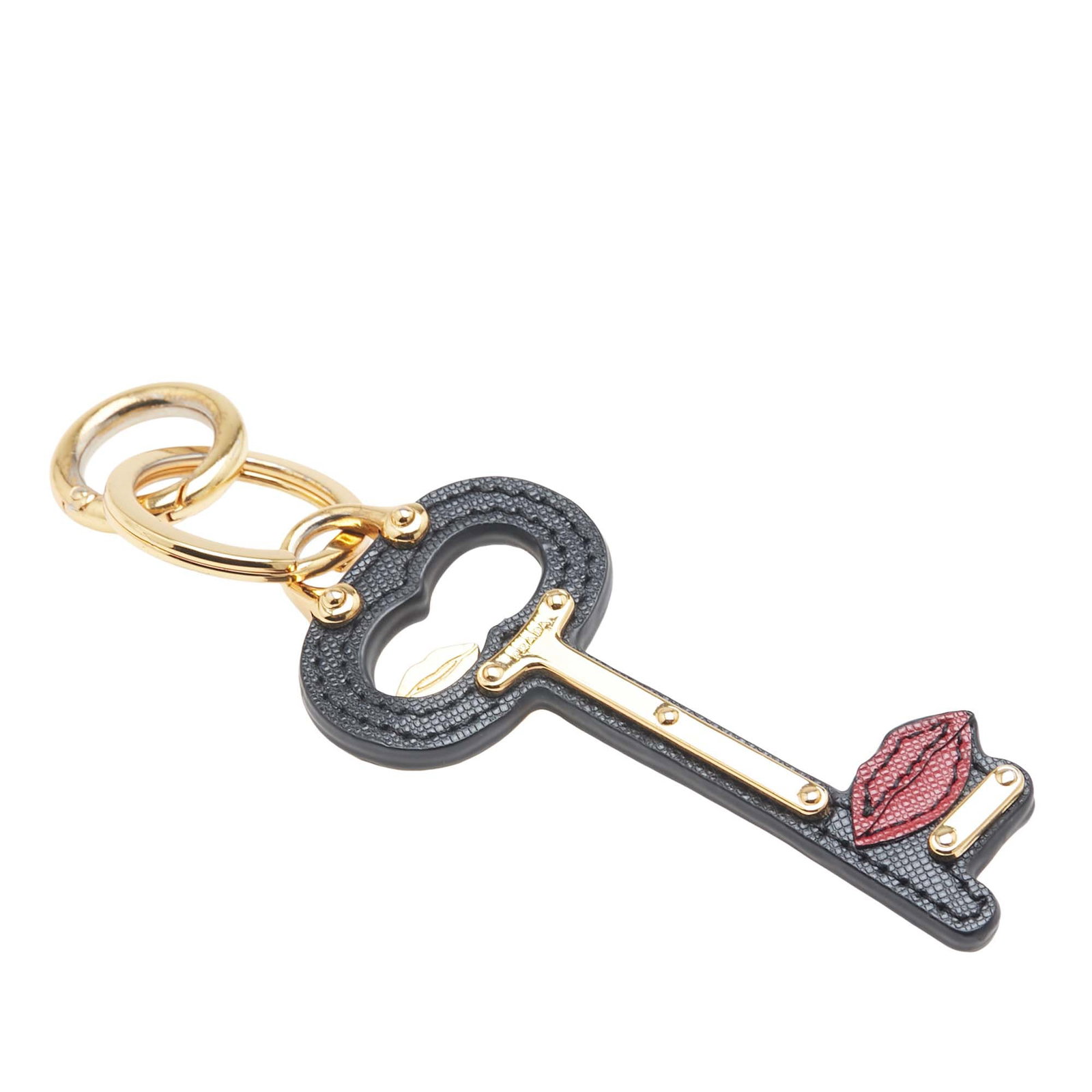 Prada Saffiano Lip Key Chain Black Leather Gold Tone Hardware: Prada Saffiano Lip Key Chain Black Leather Gold Tone Hardware The Prada Saffiano Lip Key Chain showcases a chic design crafted from premium saffiano leather in a classic black hue. It features elegant