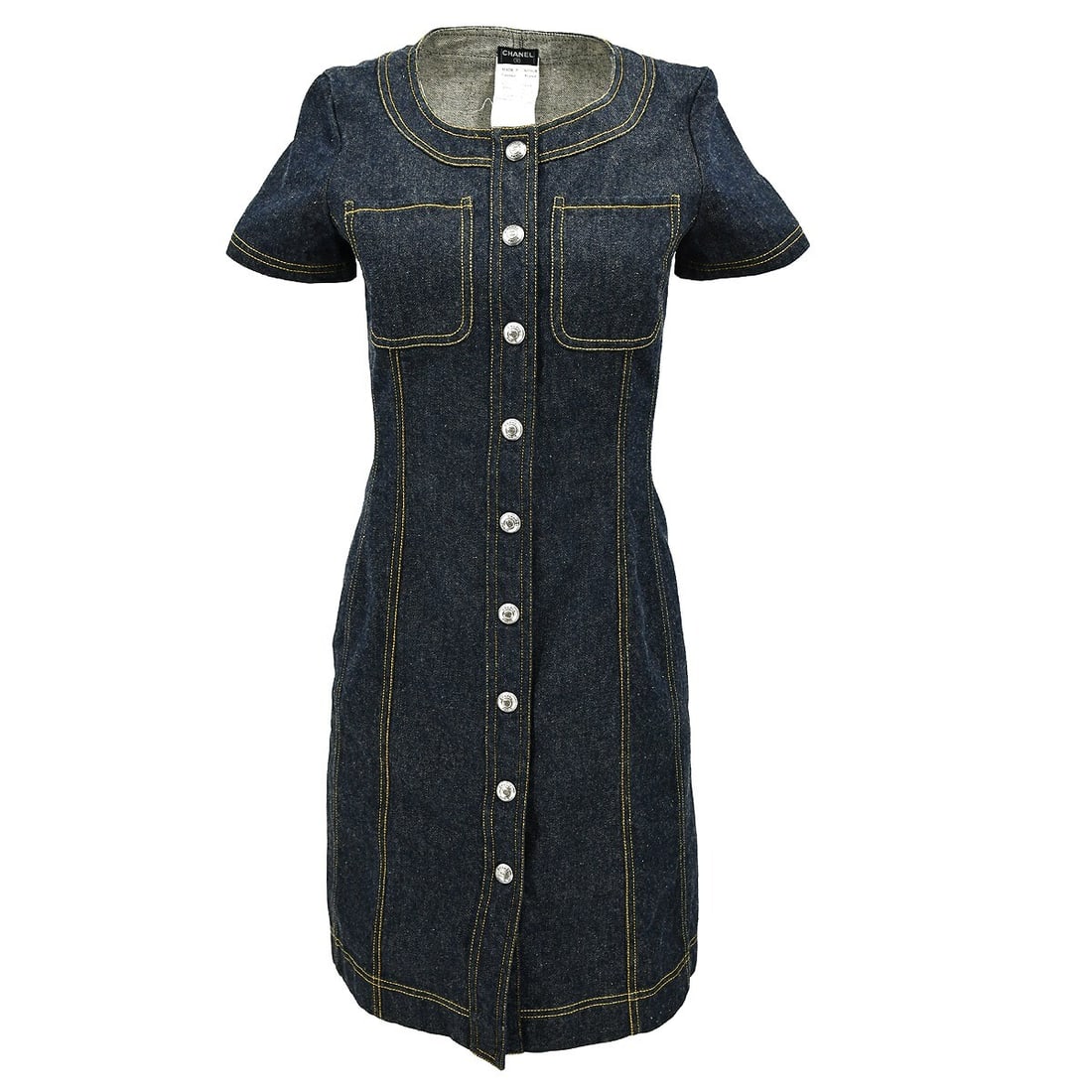 Chanel Vintage Indigo Denim Dress Short Sleeve Knee Length: Chanel Vintage Indigo Denim Dress Short Sleeve Knee Length This vintage Chanel short sleeve denim dress is a stylish choice for casual occasions. Featuring a button closure and a collared neckline, it