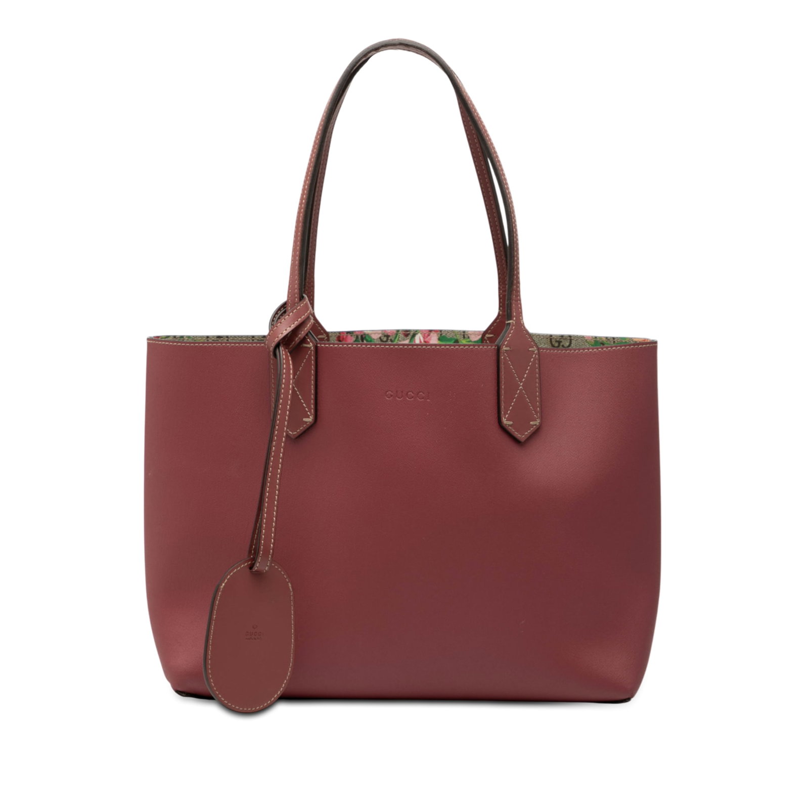 Reversible Gucci GG Supreme Blooms Small Canvas Tote Bag Beige: Reversible Gucci GG Supreme Blooms Small Canvas Tote Bag Beige This Gucci Small GG Supreme Blooms Reversible Tote features a coated canvas body with leather trim, flat leather handles, and an open top