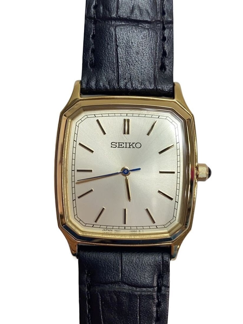 Seiko IENAxHIROB White Leather Wristwatch for Women 7N01-HAC1: Seiko IENAxHIROB White Leather Wristwatch for Women 7N01-HAC1 This SEIKO IENAxHIROB Exclusive 7N01-HAC1 women's wristwatch features a white leather band and a compact round case. Designed for women, t