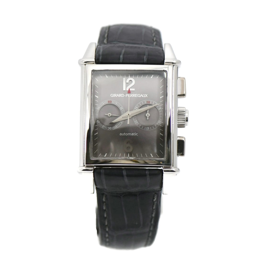 Girard Perregaux Vintage 1945 Platinum Chronograph Watch Ref 2599: Girard Perregaux Vintage 1945 Platinum Chronograph Watch Ref 2599 Discover the elegance of the Girard Perregaux Vintage 1945 Chronograph, a sophisticated wristwatch that seamlessly blends classic desi