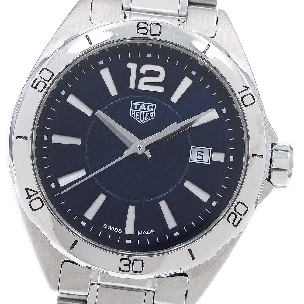 TAG Heuer Formula 1 blue dial quartz ladies wristwatch WBJ1412: TAG Heuer Formula 1 blue dial quartz ladies wristwatch WBJ1412 This TAG HEUER Formula 1 Date Quartz women's wristwatch features a stainless steel case and bracelet with a striking blue dial. The timep