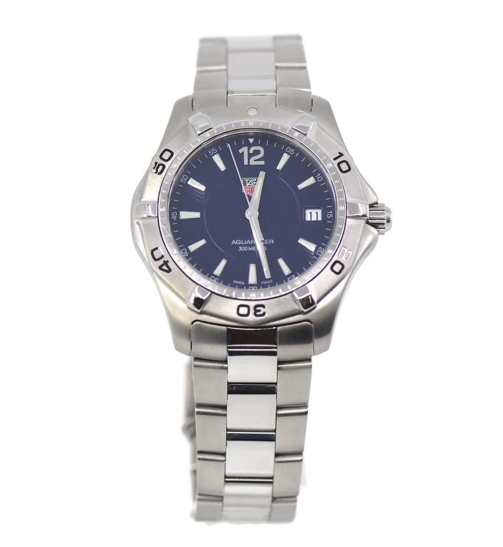 TAG Heuer Aquaracer WAF1113 Stainless Steel Quartz Watch with Box and Papers: TAG Heuer Aquaracer WAF1113 Stainless Steel Quartz Watch with Box and Papers Discover the elegance of the TAG Heuer Aquaracer Stainless Steel Watch, a perfect blend of style and functionality. This pr