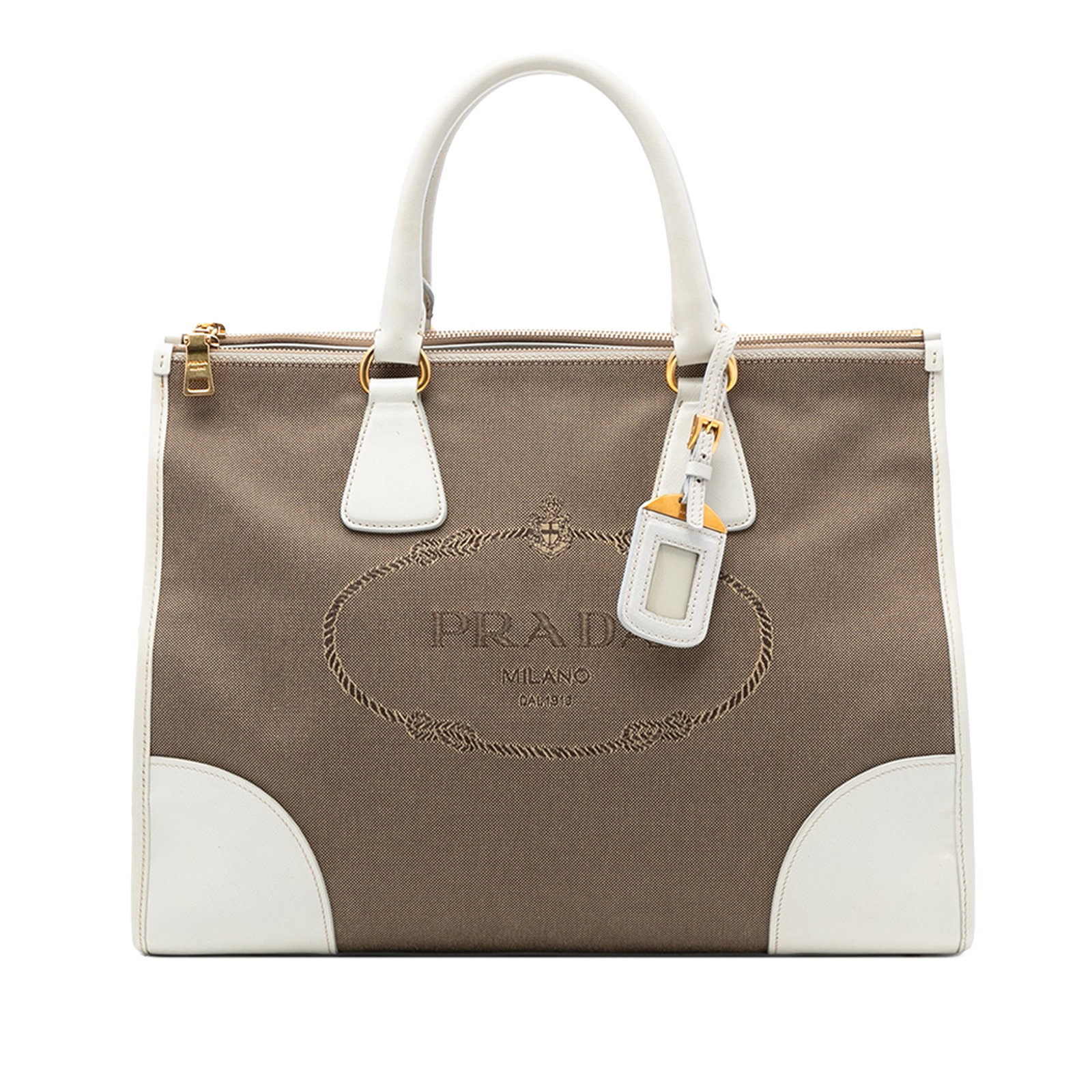 Prada Canapa Canvas Satchel with Saffiano Leather Trim and Double Zip: Prada Canapa Canvas Satchel with Saffiano Leather Trim and Double Zip This Prada Saffiano Trimmed Canvas Canapa Logo Double Zip Satchel features a canvas body with saffiano leather trim, rolled leathe