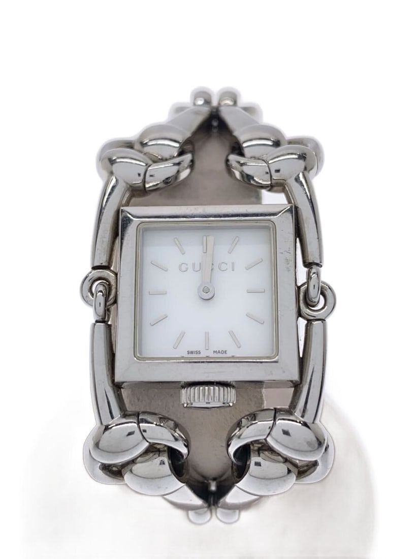 Gucci Signoria Women's Quartz Wristwatch White Dial: Gucci Signoria Women's Quartz Wristwatch White Dial This pre-owned GUCCI Signoria Quartz 116.5 women's wristwatch features a white design with subtle signs of use. Crafted in Switzerland, the watch of