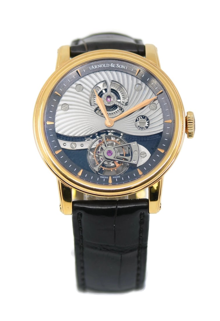 Arnold & Son TE8 Tourbillon 18K Rose Gold Wristwatch 1SJAP.B01A.C113A: Arnold & Son TE8 Tourbillon 18K Rose Gold Wristwatch 1SJAP.B01A.C113A Experience the exquisite craftsmanship of the Arnold & Son TE8 Tourbillon, a stunning wristwatch crafted from 18K rose gold. This 