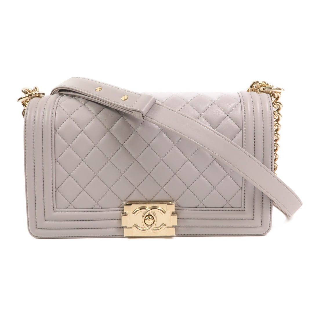Chanel Boy 25 Grey Lambskin Shoulder Bag with Gold Tone CC Hardware: Chanel Boy 25 Grey Lambskin Shoulder Bag with Gold Tone CC Hardware This CHANEL Boy 25 chain shoulder bag features a sleek gray lambskin leather exterior and elegant gold-tone hardware. Designed for w