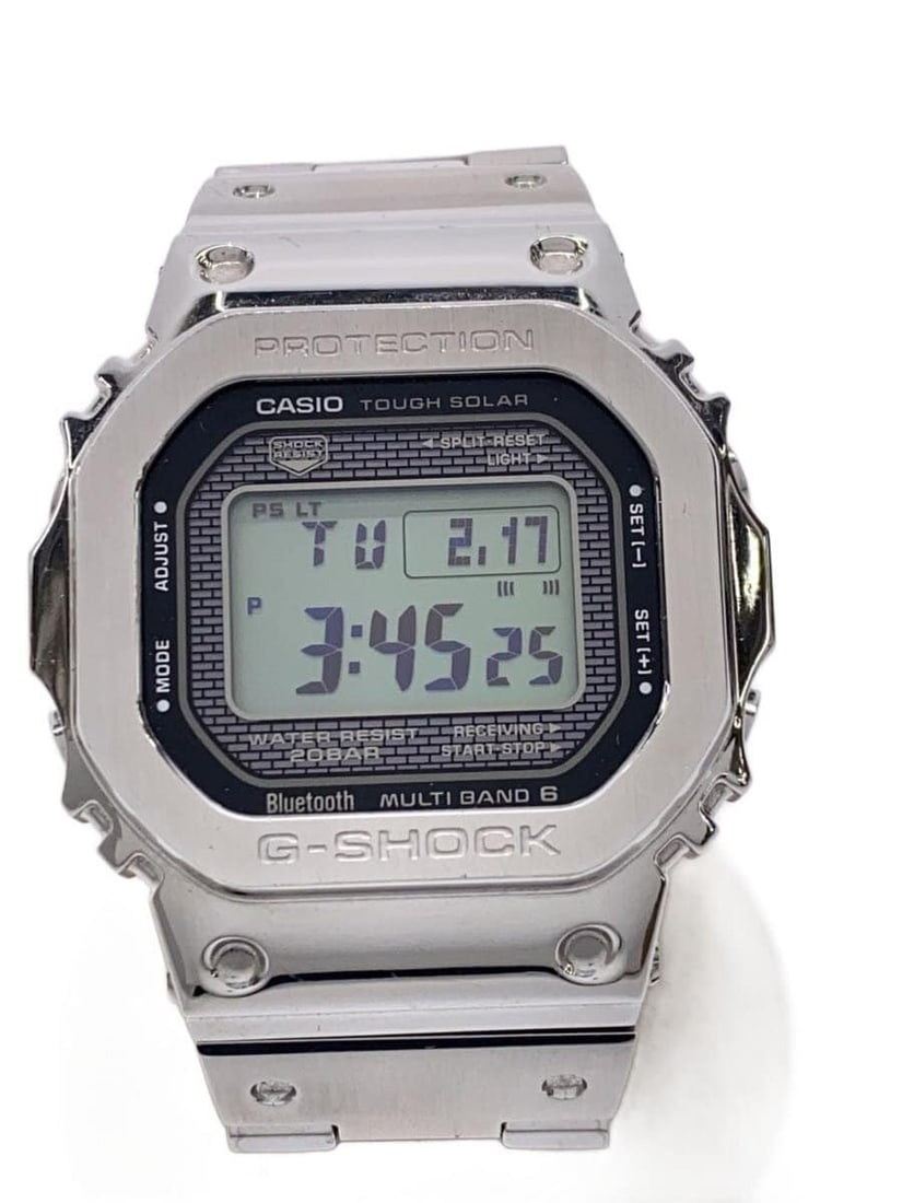 CASIO G-SHOCK GMW-B5000D-1JF Stainless Steel Wristwatch: CASIO G-SHOCK GMW-B5000D-1JF Stainless Steel Wristwatch This is a pre-owned CASIO G-SHOCK GMW-B5000D-1JF men's wristwatch featuring a durable stainless steel construction in a silver finish. The watch