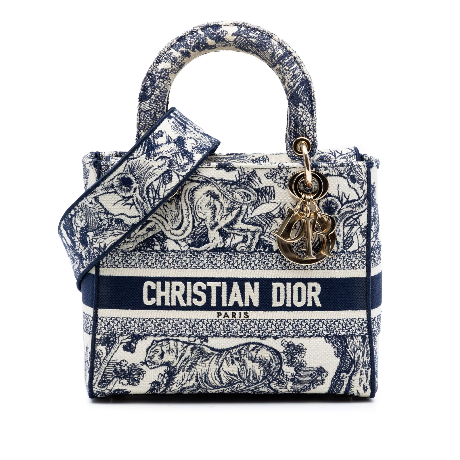 Dior Lady D-Lite Medium Embroidered Canvas Blue Handbag with Detachable Strap: Dior Lady D-Lite Medium Embroidered Canvas Blue Handbag with Detachable Strap The Lady D-Lite handbag showcases an embroidered canvas body with flat embroidered canvas handles and a detachable strap. 