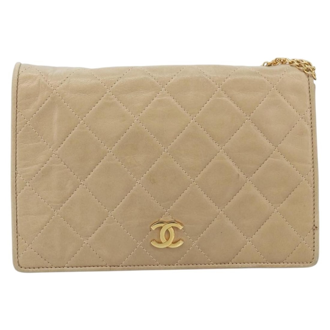 Vintage Chanel Quilted Lambskin Leather Full Flap Handbag Beige: Vintage Chanel Quilted Lambskin Leather Full Flap Handbag Beige This vintage Chanel Full Flap bag features quilted beige lambskin leather crafted in Italy. Designed for women, it showcases a classic r