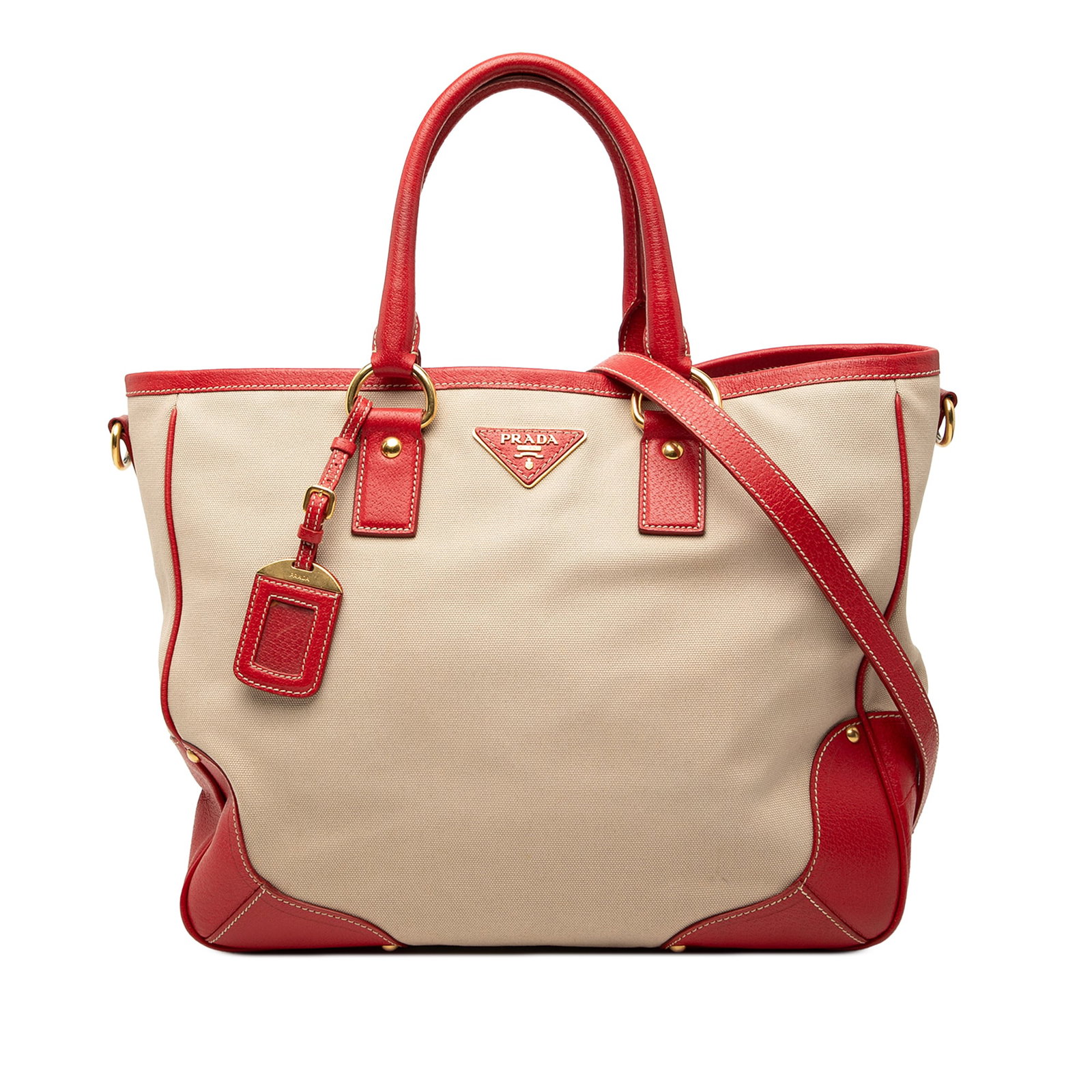 Prada Canapa Convertible Tote with Saffiano Leather Trim Beige: Prada Canapa Convertible Tote with Saffiano Leather Trim Beige This Prada Large Saffiano Trimmed Canapa Convertible Tote features a beige canvas body accented with saffiano leather trim. It is designe