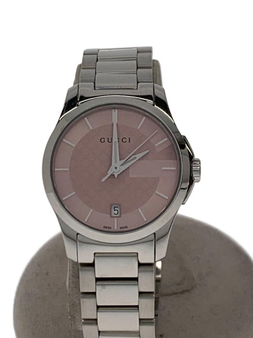 Gucci G Timeless Swiss Silver Women Wristwatch 126.5: Gucci G Timeless Swiss Silver Women Wristwatch 126.5 This is a pre-owned Gucci G-Timeless 126.5 women's wristwatch featuring a silver-tone case and band. Crafted in Switzerland, the watch is in slight