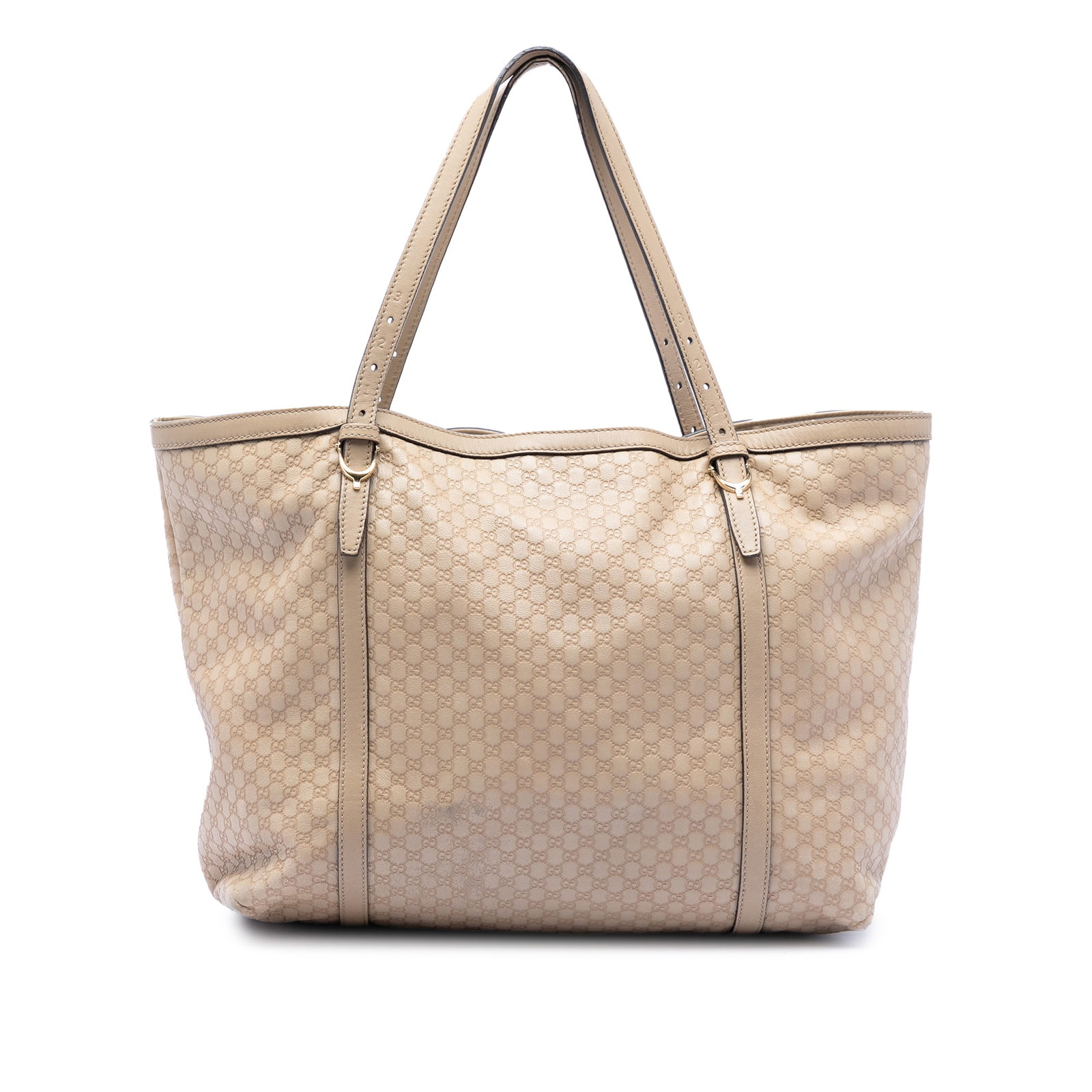 Gucci Microguccissima Beige Leather Tote Bag with Embossed Design: Gucci Microguccissima Beige Leather Tote Bag with Embossed Design This Gucci Microguccissima Nice Tote features an embossed leather exterior in beige, flat leather straps, an open top with a lobster c