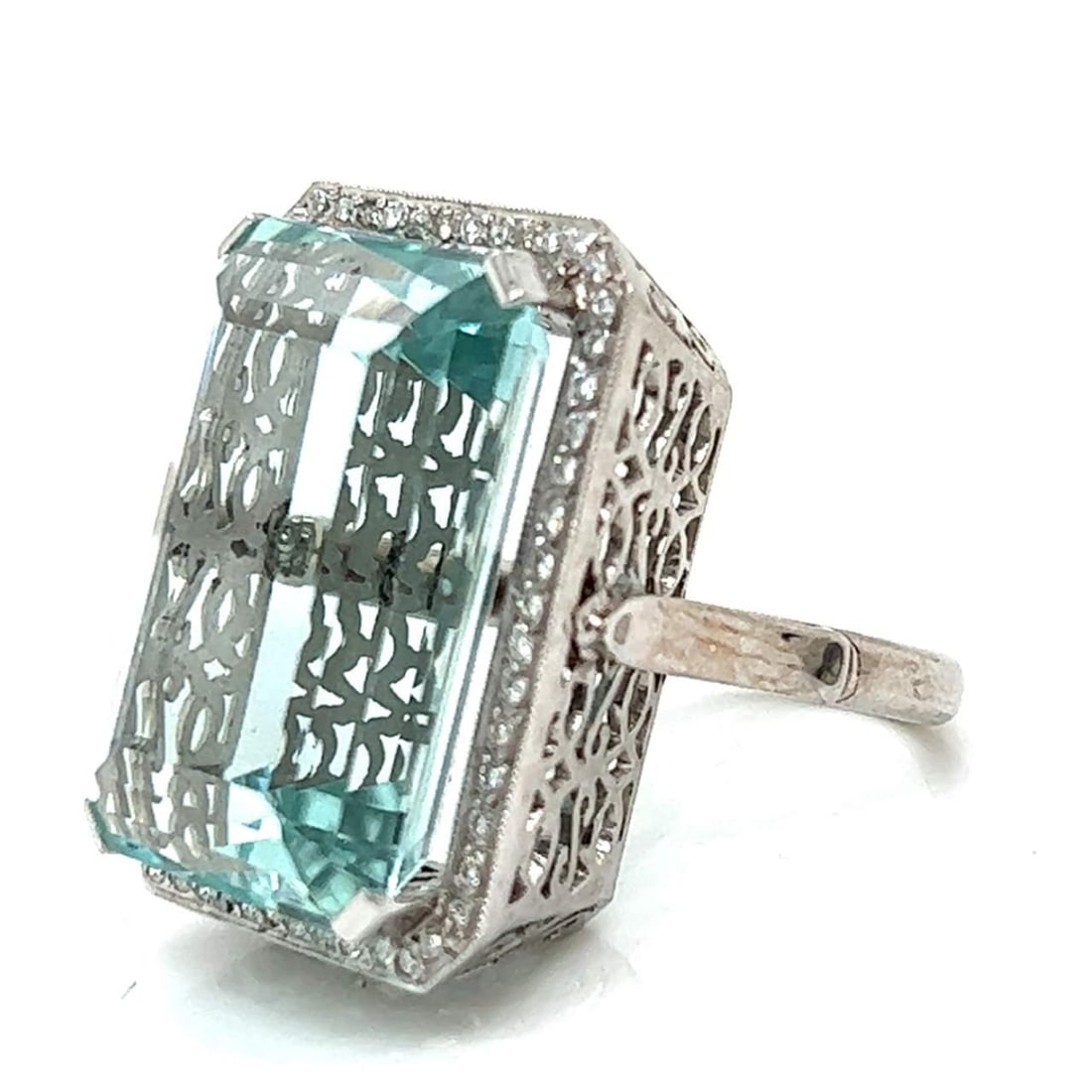 Platinum 18K White Gold Aquamarine Diamond Ring 47 Ct 56 Diamonds: Platinum 18K White Gold Aquamarine Diamond Ring 47 Ct 56 Diamonds This stunning ring features a captivating combination of Platinum and 18K White Gold, showcasing an impressive approximate 47.00 Ct. A