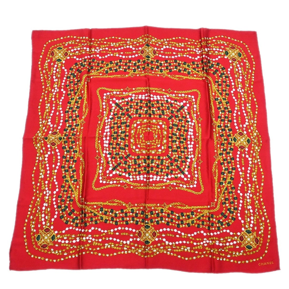 Red Scarf by Chanel Made in Italy: Red Scarf by Chanel Made in Italy This is a red scarf from Chanel, crafted in Italy. It is in very good condition, making it a stylish accessory for various occasions. Specifications Brand: Chanel Typ