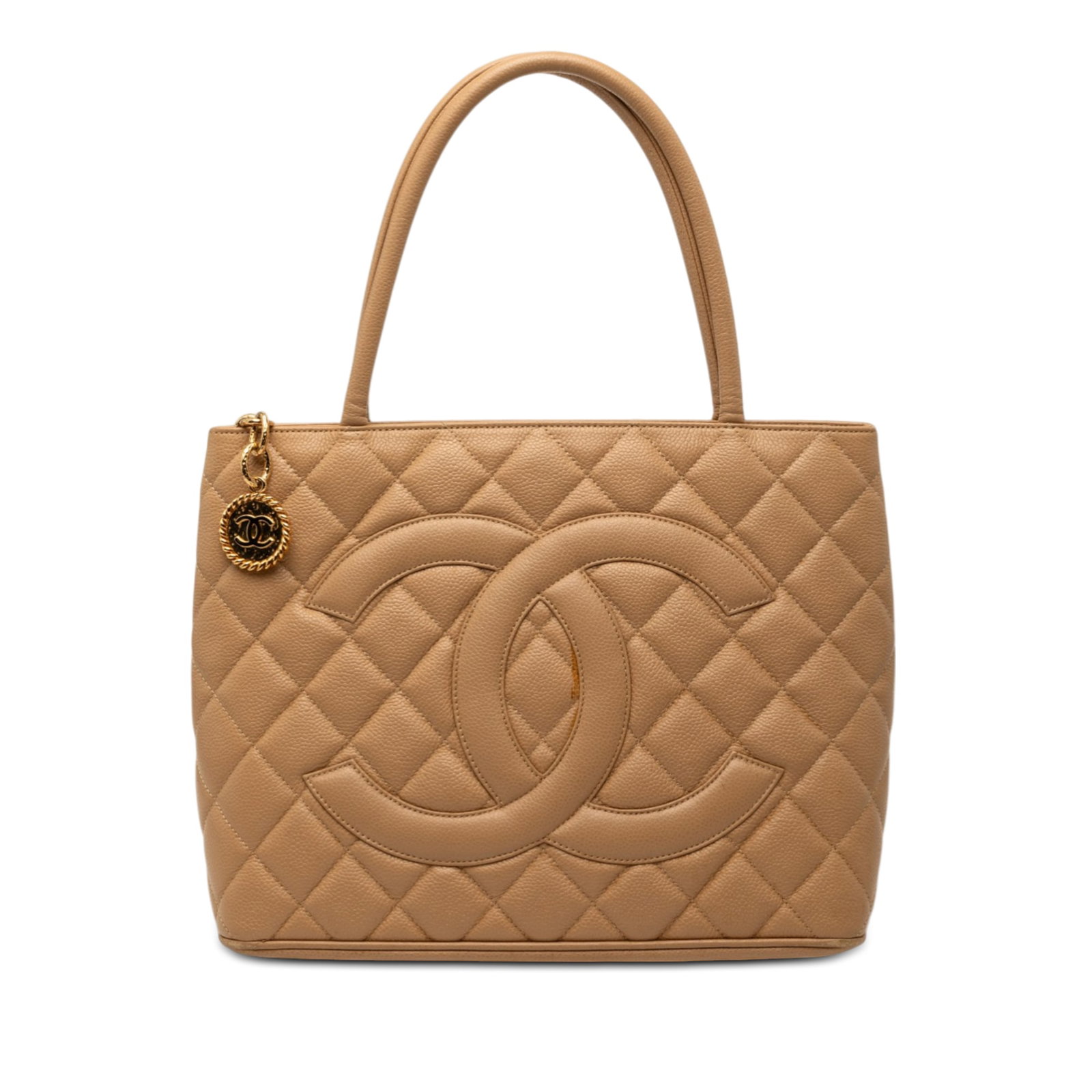 Brown Quilted Leather Medallion Tote Bag by Chanel: Brown Quilted Leather Medallion Tote Bag by Chanel This Chanel Caviar Medallion Tote features a quilted caviar leather exterior in brown, rolled leather handles, a top zip closure, an exterior back sl