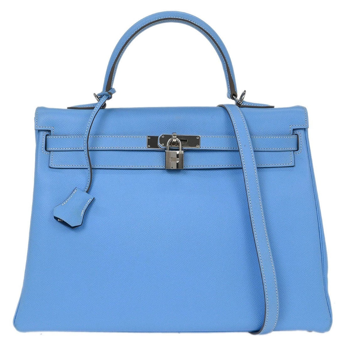 Hermes Kelly 35 Blue Epsom Leather 2way Handbag with Silver Hardware: Hermes Kelly 35 Blue Epsom Leather 2way Handbag with Silver Hardware Introducing the luxurious Hermes Blue Aztec Epsom Kelly 35 Retourne handbag, a stunning addition to your collection. This medium-si