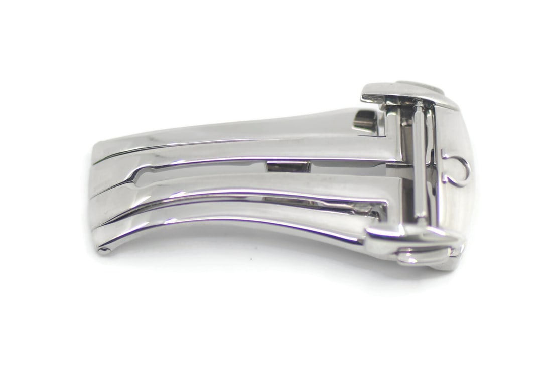 Authentic Omega Stainless Steel Wristwatch Buckle 16mm: Authentic Omega Stainless Steel Wristwatch Buckle 16mm This Omega wristwatch band features a durable stainless steel buckle with a band width of 16 mm. Designed for optimal performance and style, this