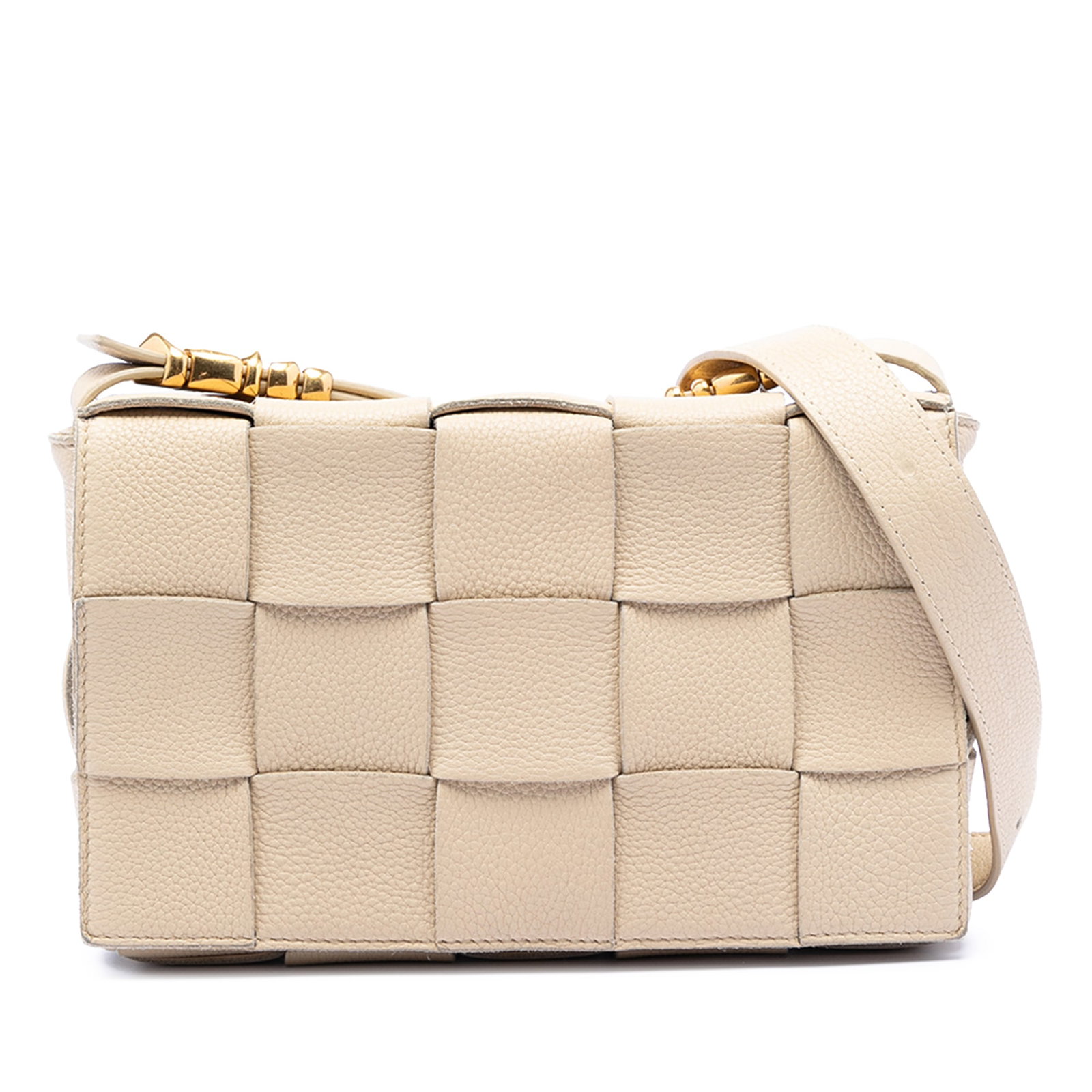 Bottega Veneta Cassette Brown Woven Leather Crossbody Bag: Bottega Veneta Cassette Brown Woven Leather Crossbody Bag This Bottega Veneta Cassette crossbody bag features the iconic Intrecciato woven leather design in brown grained calfskin. It includes a flat 