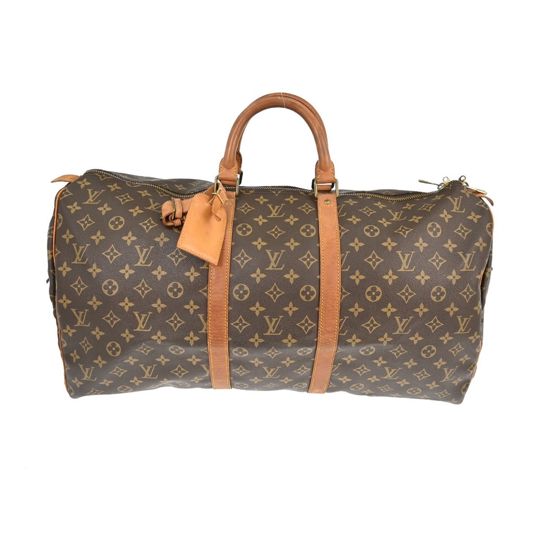 Keepall Monogram Canvas Unisex Travel Bag by Louis Vuitton: Keepall Monogram Canvas Unisex Travel Bag by Louis Vuitton The Louis Vuitton Keepall Bag features the signature monogram canvas in brown and is designed for unisex use. This vintage bag shows signs of