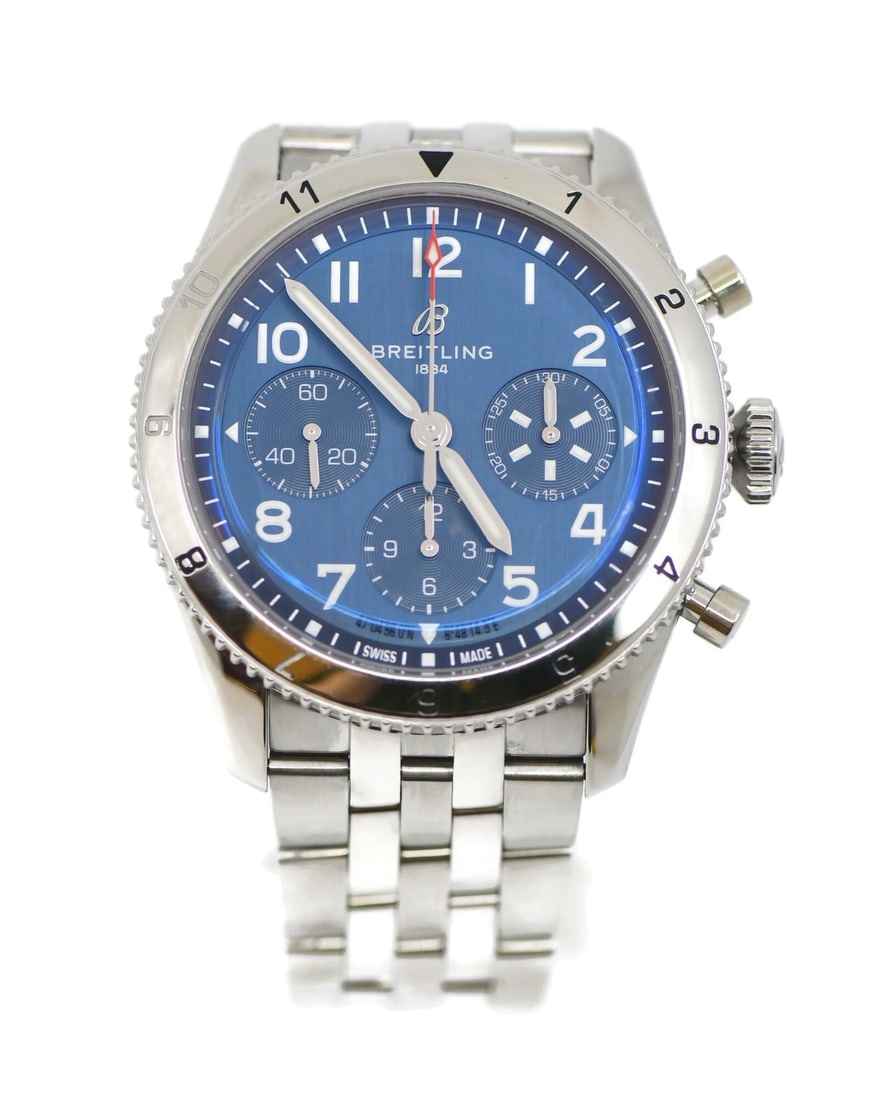 Men's Avi Chronograph Blue Dial Stainless Steel Wristwatch A23380 with Box: Men's Avi Chronograph Blue Dial Stainless Steel Wristwatch A23380 with Box This Breitling Classic Avi Chronograph wristwatch features a polished stainless steel case and bracelet, complemented by a si