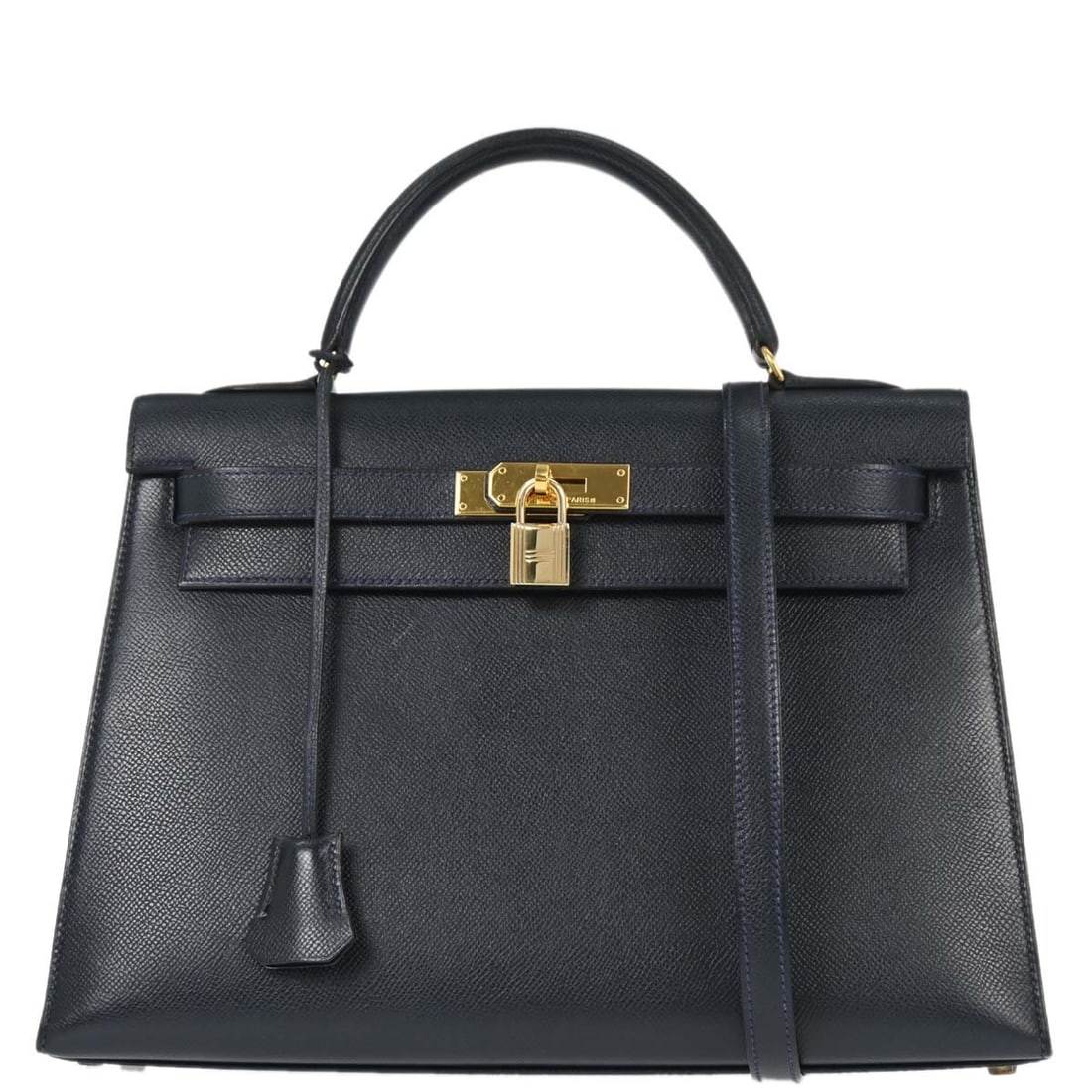 Blue Indigo Kelly 32 Sellier Leather Satchel with Detachable Strap by Hermes: Blue Indigo Kelly 32 Sellier Leather Satchel with Detachable Strap by Hermes This Hermes Kelly 32 Sellier handbag is crafted from blue indigo Courchevel leather and features a structured silhouette. I