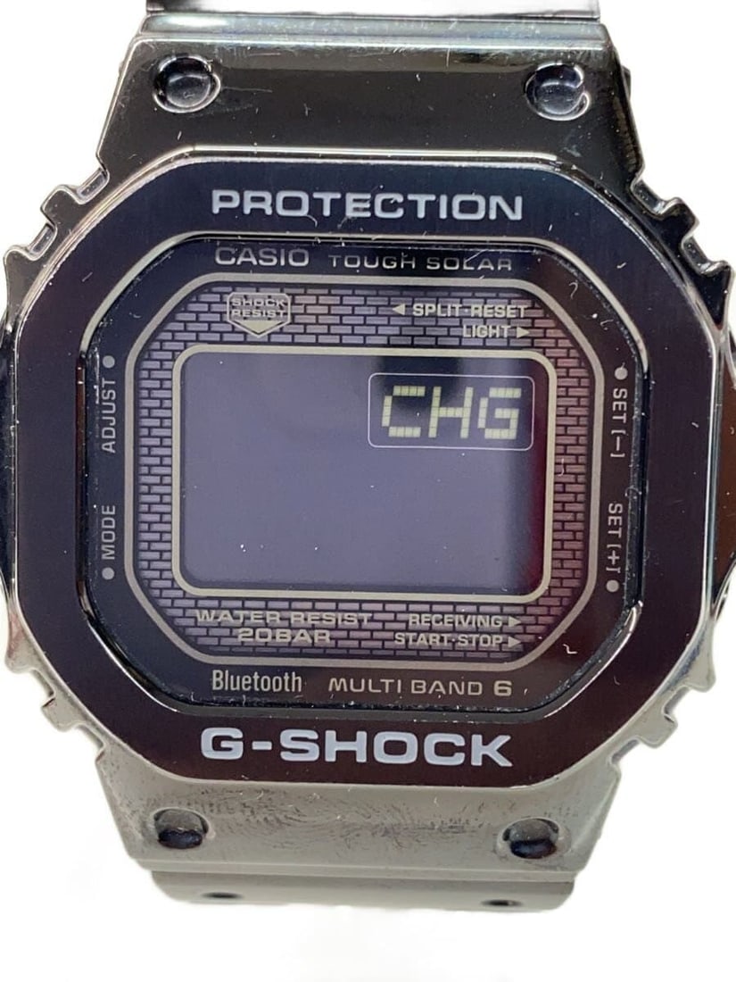 CASIO G-SHOCK Black GMW-B5000GD-1JF Wristwatch: CASIO G-SHOCK Black GMW-B5000GD-1JF Wristwatch This CASIO G-SHOCK GMW-B5000GD-1JF is a men's wristwatch featuring a black case and band. Made in Japan, it is designed for durability and practicality, 