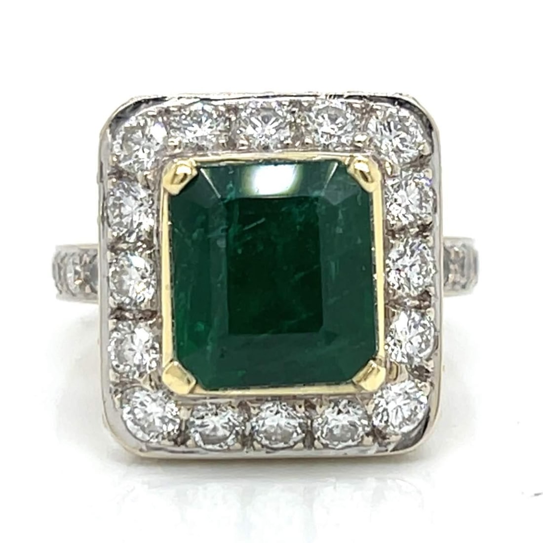 18K White Gold Emerald 3.00 Ct Diamond Ring with 76 Diamonds: 18K White Gold Emerald 3.00 Ct Diamond Ring with 76 Diamonds This exquisite ring features a stunning 3.00 Ct. emerald, beautifully complemented by 76 diamonds that collectively weigh approximately 3.0
