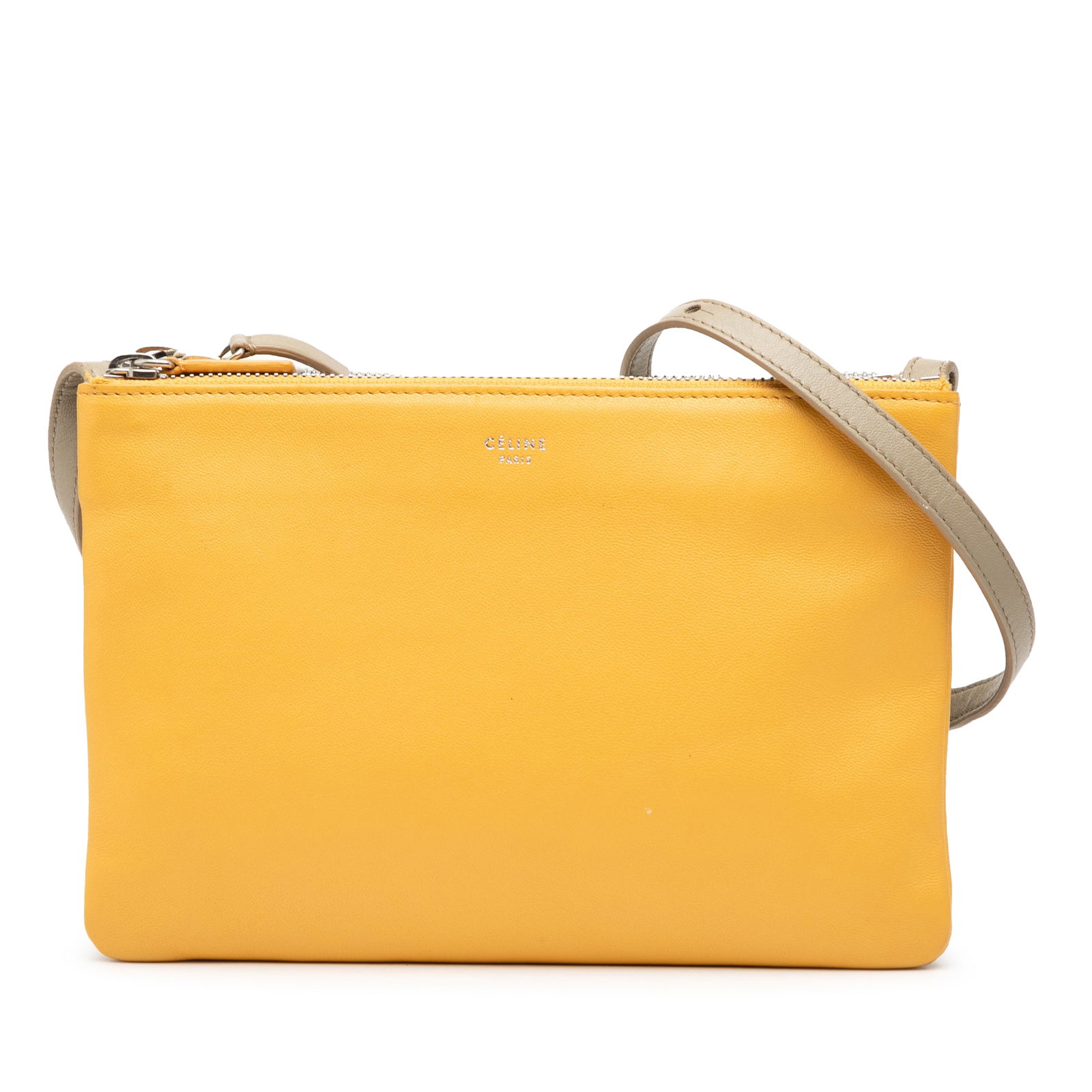 Celine Trio Crossbody Bag in Large Tricolor Lambskin Leather: Celine Trio Crossbody Bag in Large Tricolor Lambskin Leather This Celine Large Tricolor Lambskin Trio Crossbody features a lambskin leather body in a tricolor design. It is equipped with an adjustable
