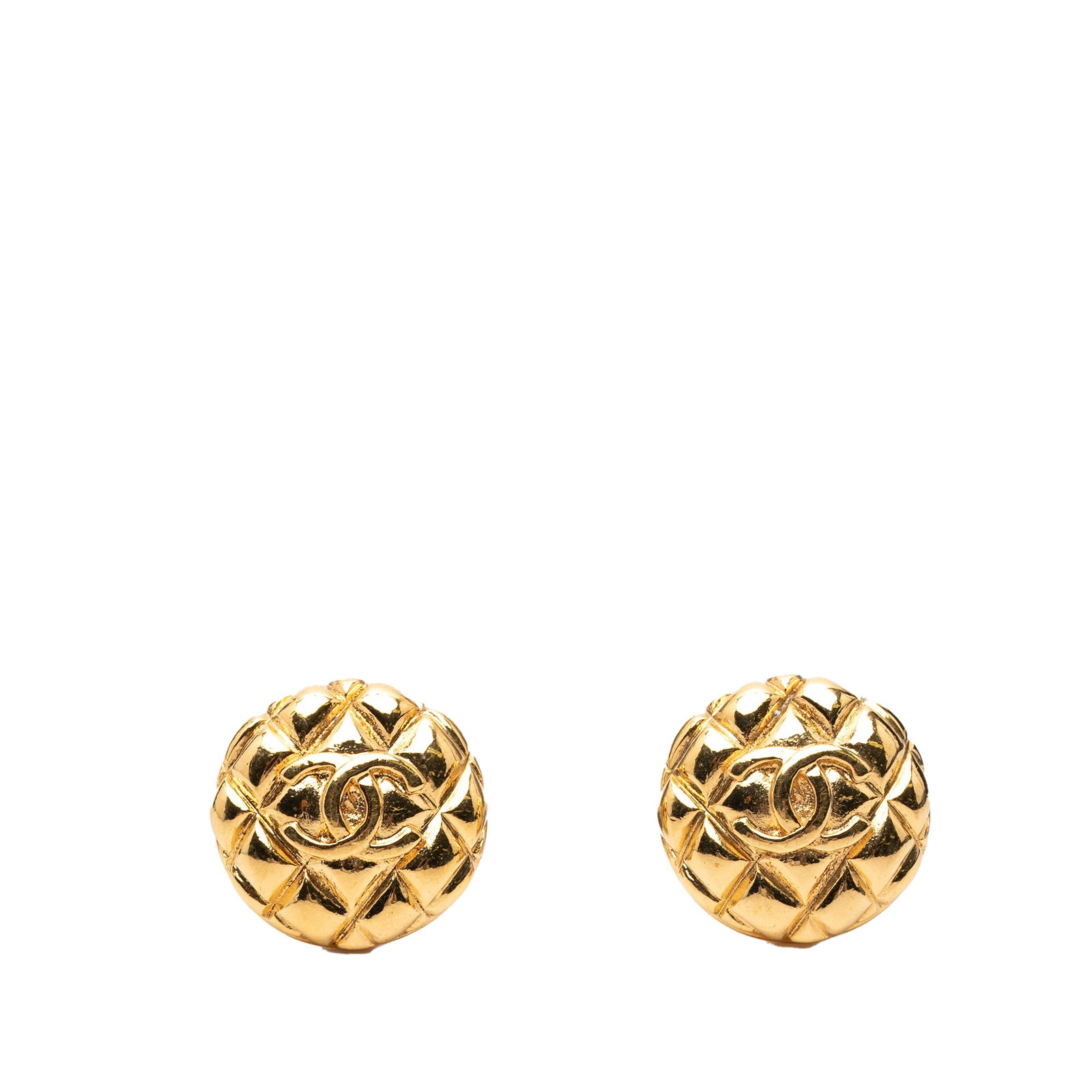 Chanel Quilted CC Round Gold Plated Clip Earrings: Chanel Quilted CC Round Gold Plated Clip Earrings These Chanel earrings feature a round quilted design crafted from gold plated metal, completed with secure clip-on back closures. Made in France, thes