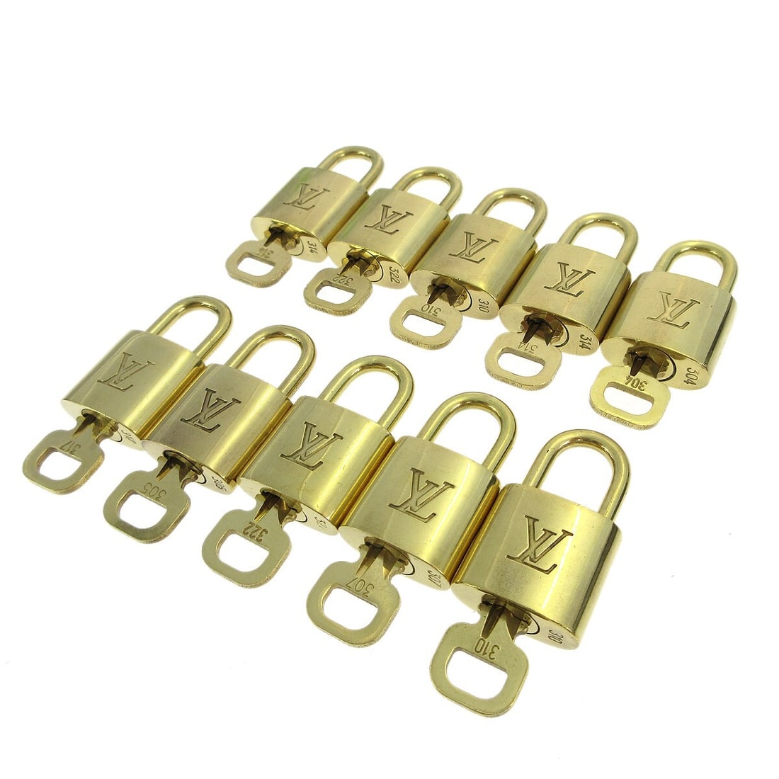 Set of 10 Gold Tone Padlock and Key Charms by Louis Vuitton: Set of 10 Gold Tone Padlock and Key Charms by Louis Vuitton This is a set of 10 Louis Vuitton padlock and key bag accessories in a gold-tone finish. Designed for unisex use, these charms add a stylish