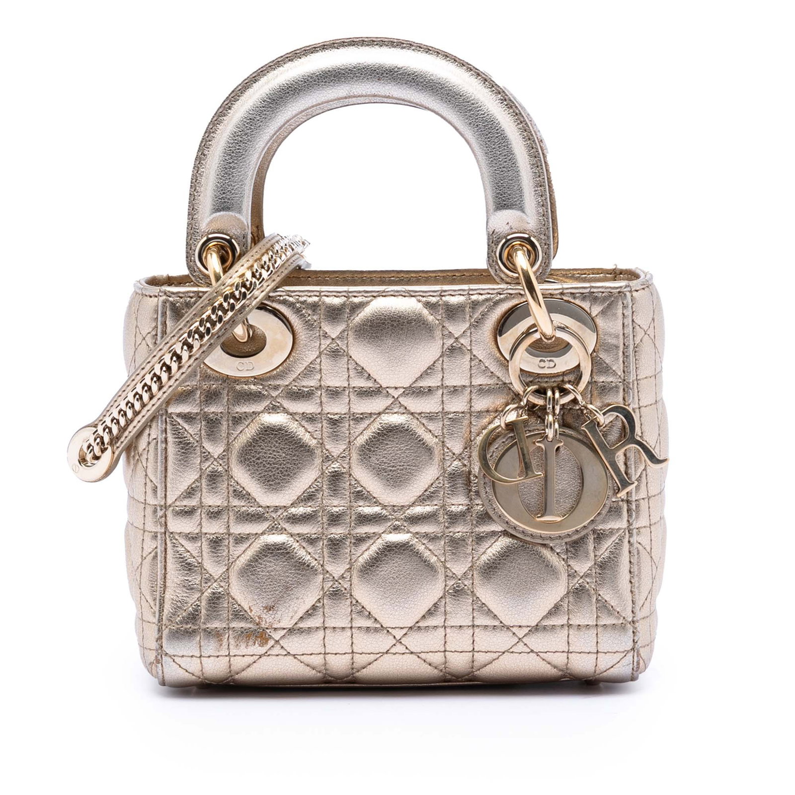 Dior Lady Dior Mini Gold Metallic Cannage Lambskin Shoulder Bag: Dior Lady Dior Mini Gold Metallic Cannage Lambskin Shoulder Bag This Mini Lady Dior handbag features a quilted metallic lambskin leather exterior in gold, flat leather top handles, a detachable chain-