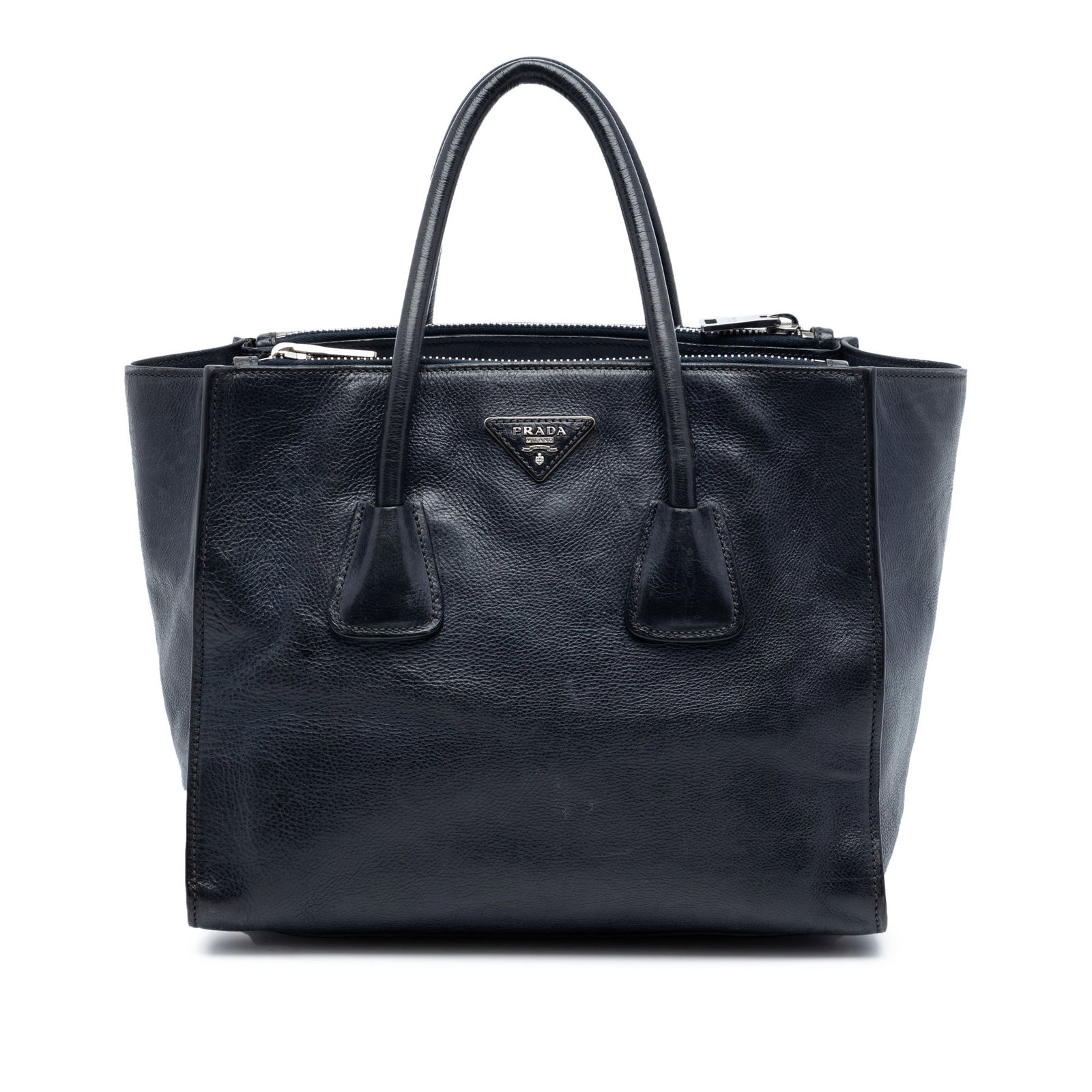 Prada Glace Calf Leather Twin Pocket Blue Satchel with Double Handles: Prada Glace Calf Leather Twin Pocket Blue Satchel with Double Handles This Prada Glace Calf Twin Pocket Double Handle Satchel is crafted from blue calf leather and features rolled leather handles, an 
