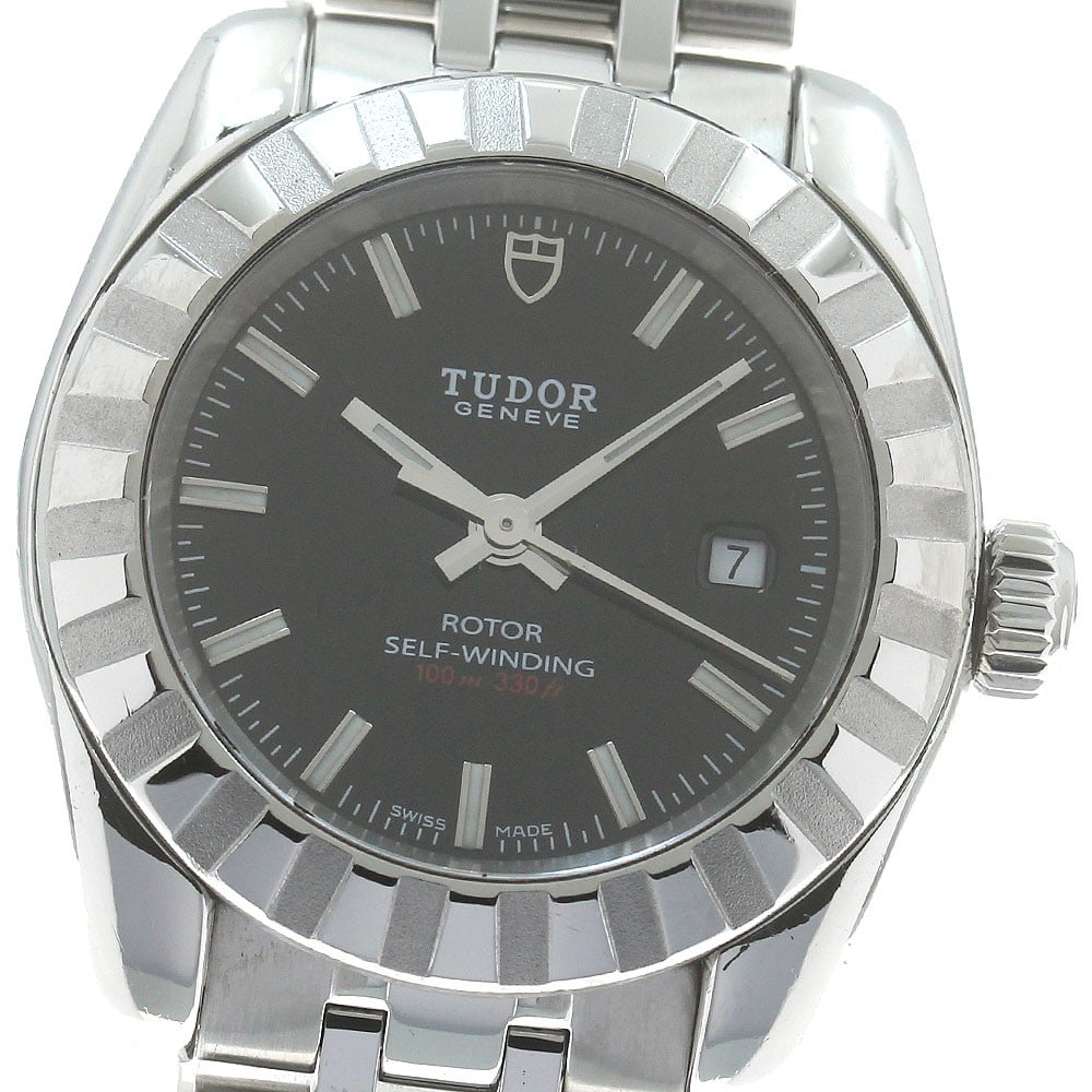 TUDOR Classic Date Ladies Automatic Stainless Steel Watch 22010: TUDOR Classic Date Ladies Automatic Stainless Steel Watch 22010 This Tudor Classic Date ladies wristwatch features a stainless steel case and band with a black dial. The watch is powered by an automat