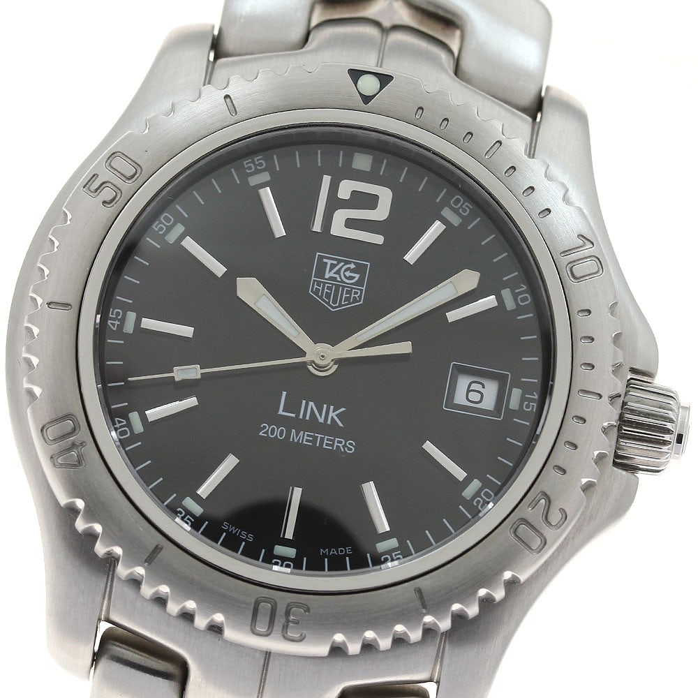 TAG Heuer Link WT1110-0 Quartz Date Men's Wristwatch: TAG Heuer Link WT1110-0 Quartz Date Men's Wristwatch This TAG HEUER Link WT1110-0 men's wristwatch features a stainless steel case and bracelet with a black dial and date function. Powered by a reliab