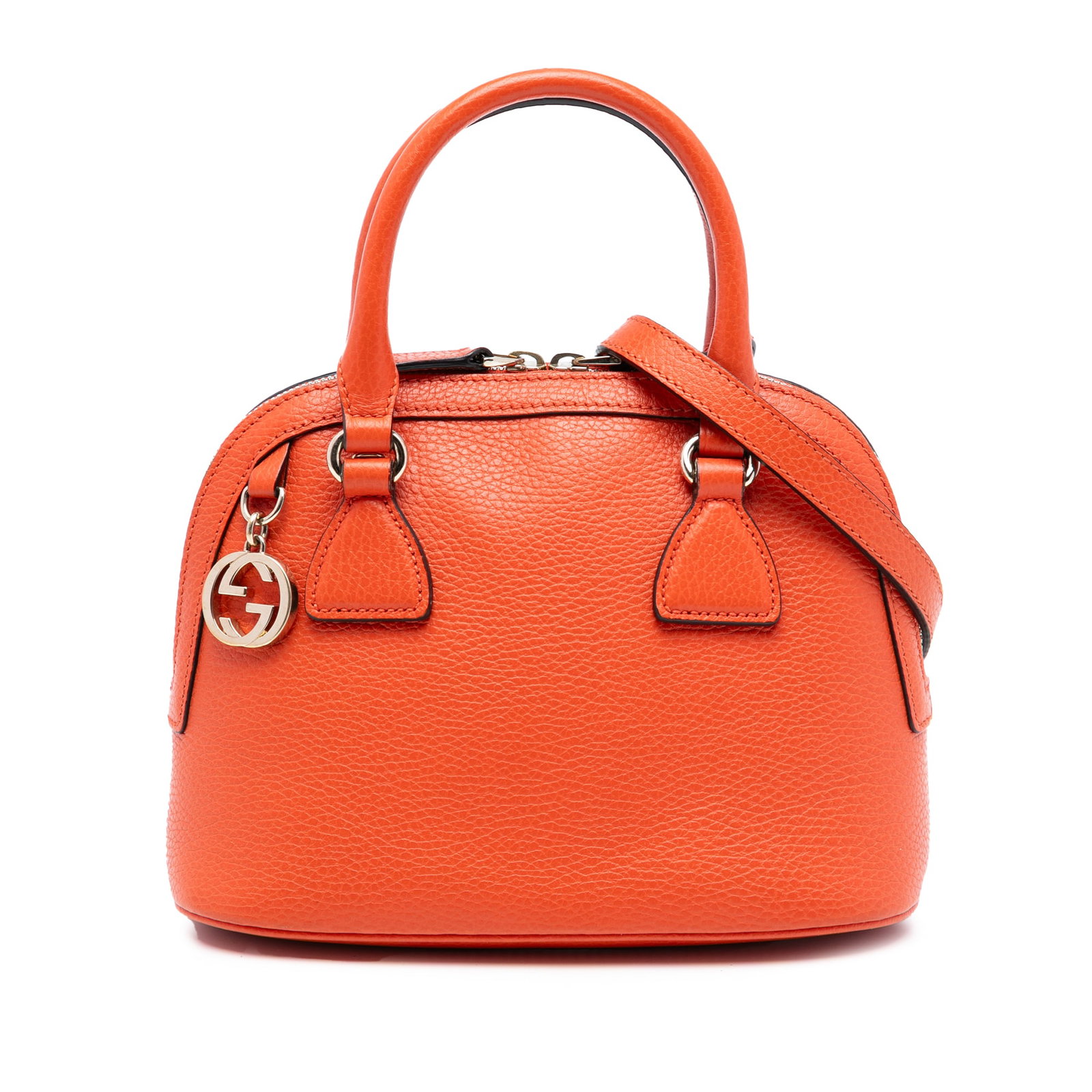 Mini Dome Satchel in Orange Leather with GG Charm by Gucci: Mini Dome Satchel in Orange Leather with GG Charm by Gucci This Gucci Mini Leather GG Charm Dome Satchel features a structured orange leather body with rolled leather handles and a detachable, adjusta