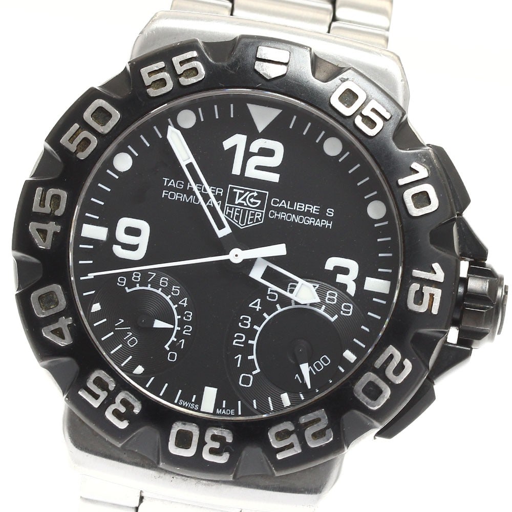 TAG Heuer Formula 1 Caliber S quartz chronograph men's wristwatch CAH7010: TAG Heuer Formula 1 Caliber S quartz chronograph men's wristwatch CAH7010 This TAG Heuer Formula 1 Caliber S Chronograph men's wristwatch features a robust stainless steel case and bracelet with a bla