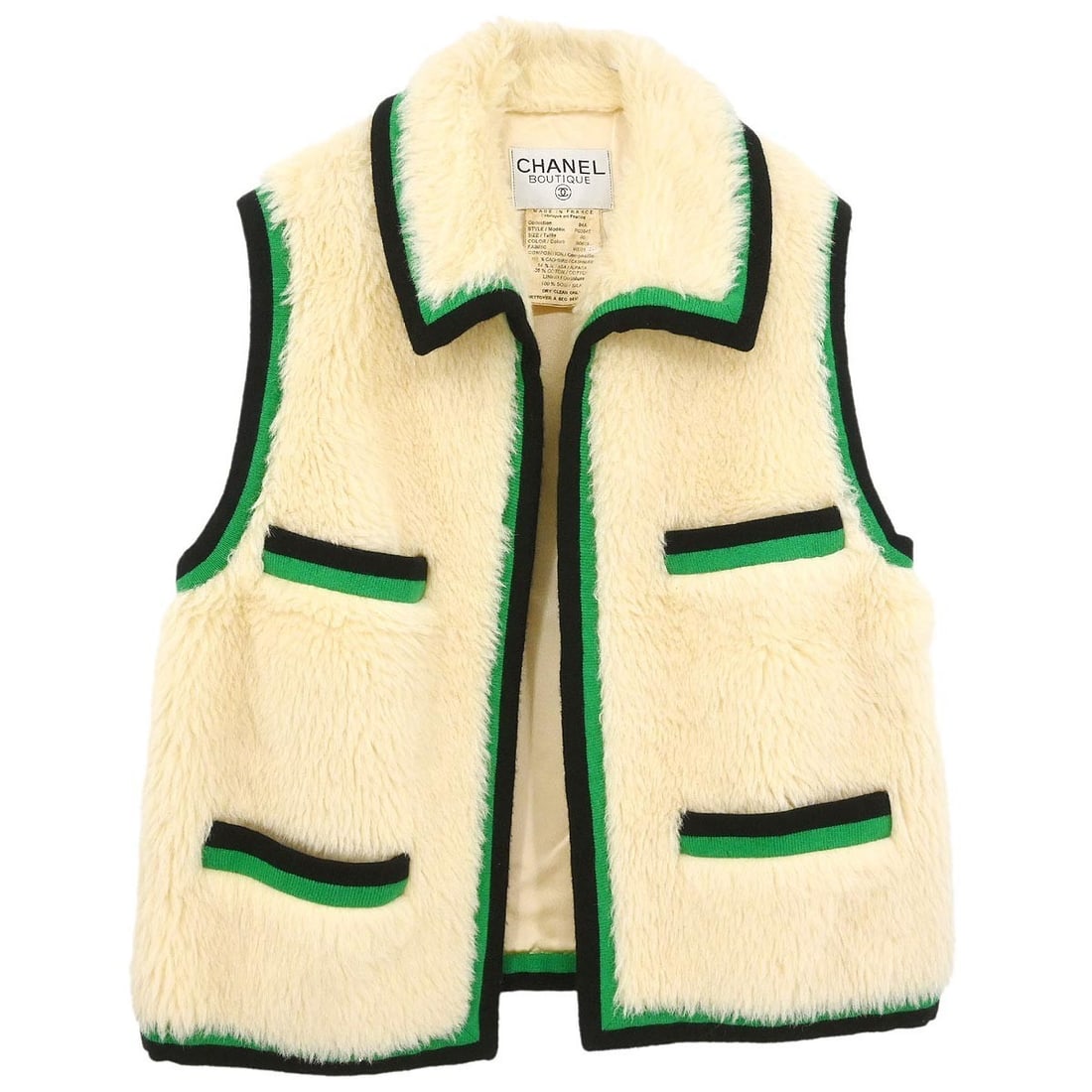 Chanel White Cashmere Alpaca Sleeveless Vest Jacket Size 40 Vintage: Chanel White Cashmere Alpaca Sleeveless Vest Jacket Size 40 Vintage This Chanel sleeveless vest jacket features a mid-length design crafted from a luxurious blend of 100% cashmere, 64% alpaca, and 36%