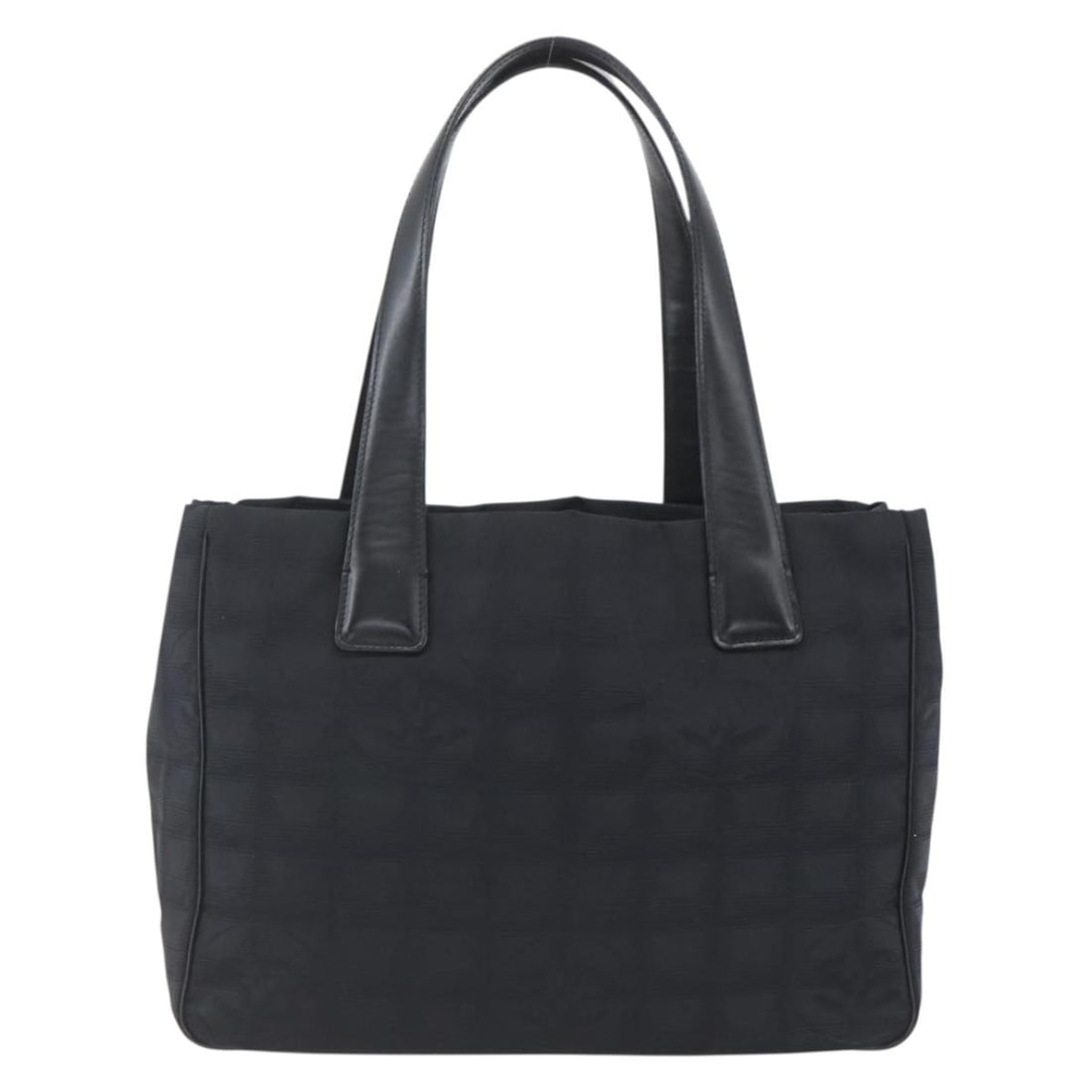 Black Nylon Chanel Travel Line Tote Bag from France: Black Nylon Chanel Travel Line Tote Bag from France This Chanel Travel Line Tote is crafted from durable black nylon and designed for women. The bag features a spacious interior and showcases slight r