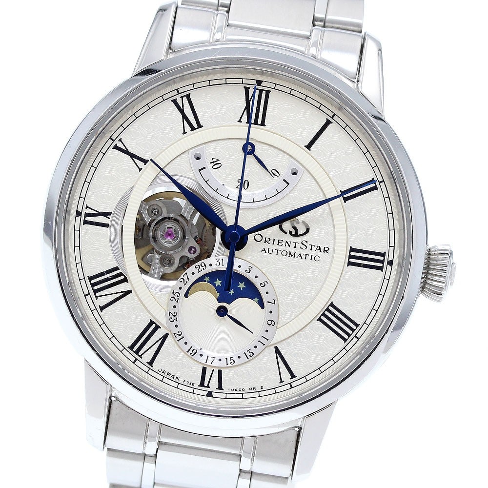 Orient Star Moon Phase Automatic Stainless Steel Men's Watch: Orient Star Moon Phase Automatic Stainless Steel Men's Watch This Orient Star Moon Phase Power Reserve wristwatch features a stainless steel case and bracelet with a silver dial. Designed for men, it 