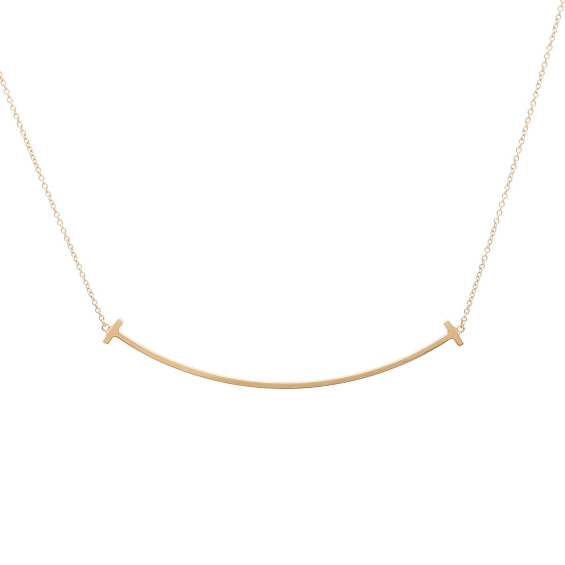 Tiffany T Smile 18K Rose Gold Necklace for Women: Tiffany T Smile 18K Rose Gold Necklace for Women This Tiffany & Co. T-Smile necklace features an elegant design crafted in 18K rose gold. Designed for women, the necklace showcases a refined gold tone