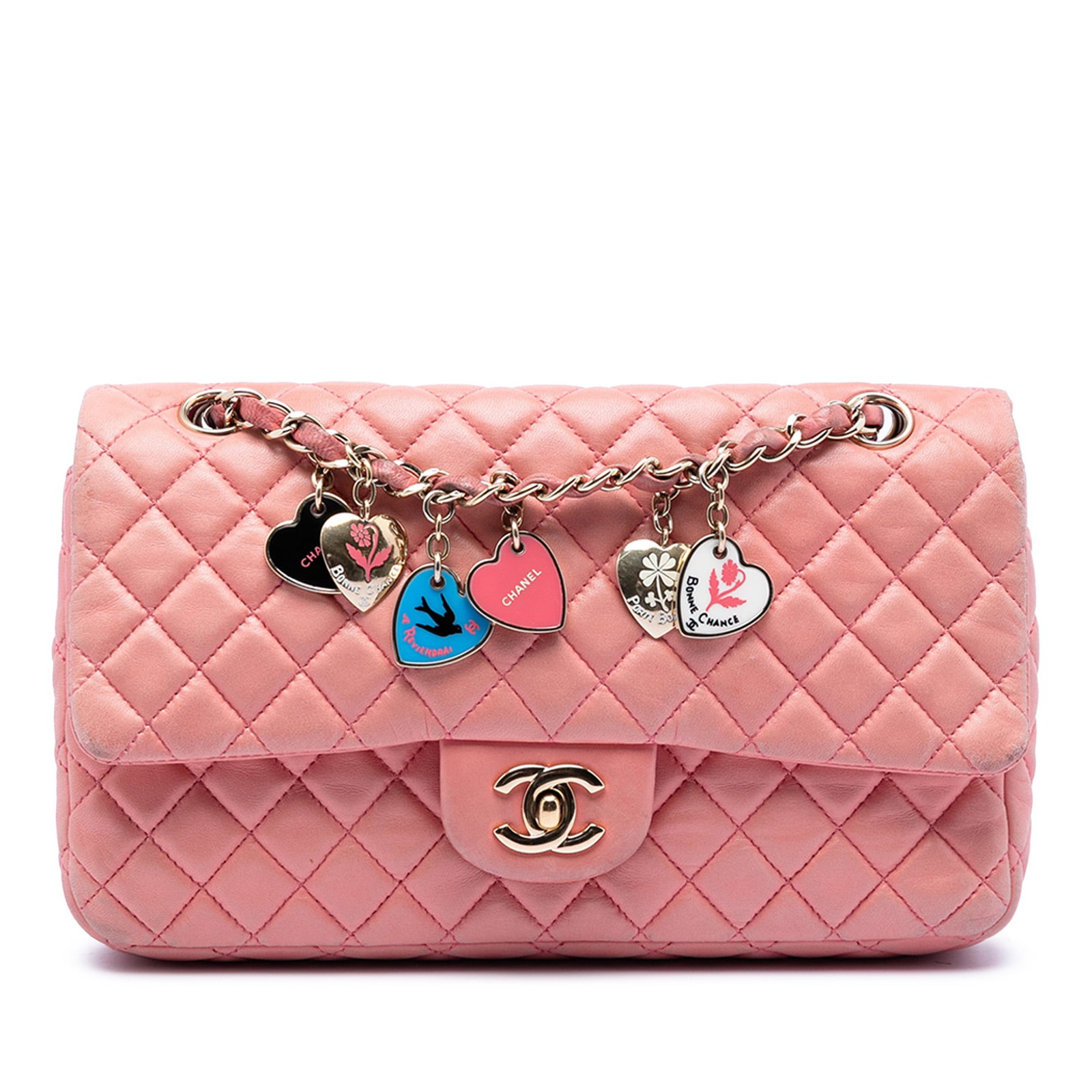 Chanel Pink Medium Flap Bag with Heart Charms Quilted Lambskin: Chanel Pink Medium Flap Bag with Heart Charms Quilted Lambskin This Chanel Medium Classic Lambskin Valentines Heart Charms Single Flap bag features a quilted pink lambskin leather body with a gold-ton