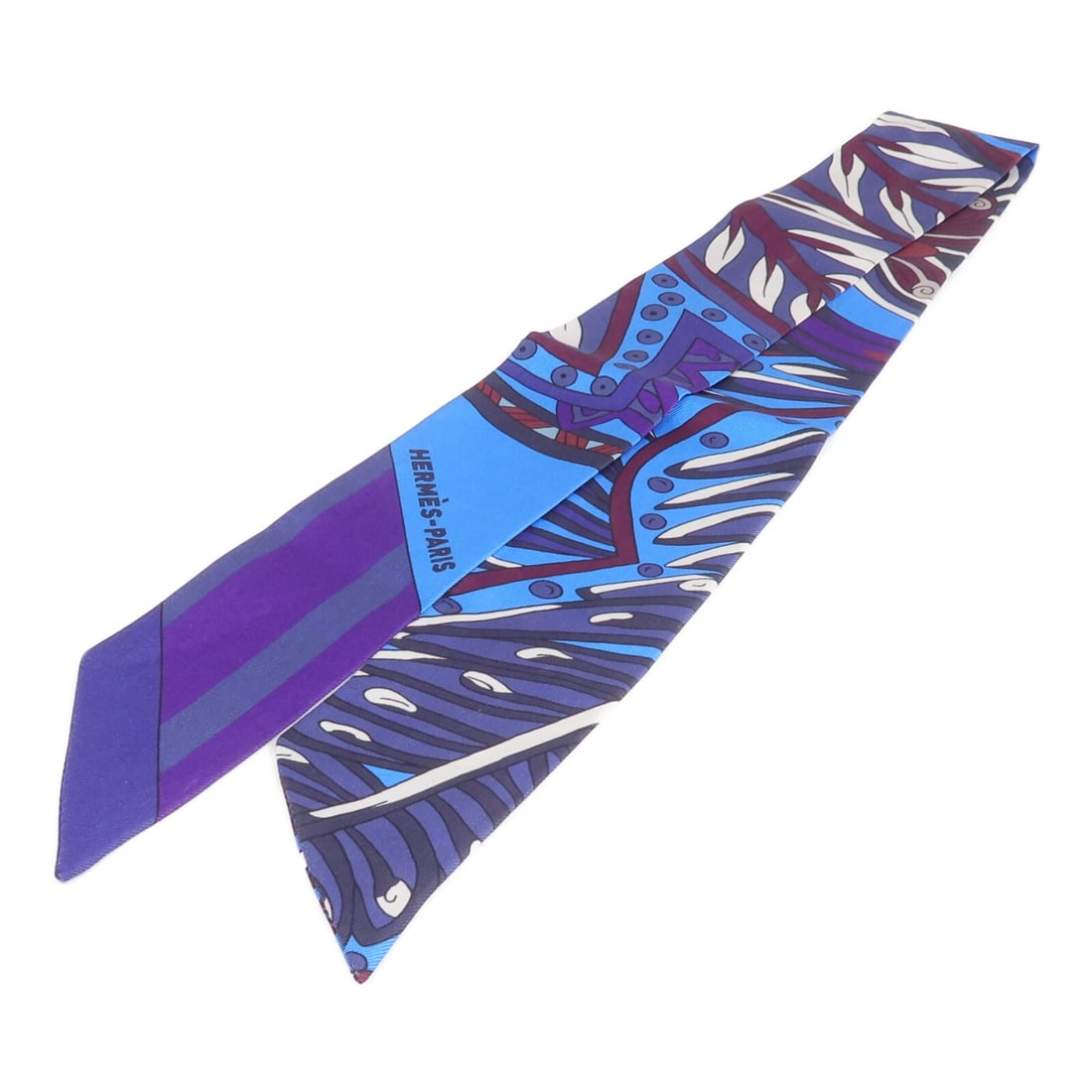 Hermes Silk Twilly Blue and Purple Women's Scarf France: Hermes Silk Twilly Blue and Purple Women's Scarf France This Hermes Twilly scarf is crafted from silk and features a blue and purple color palette. Designed for women, it offers a stylish and versatil