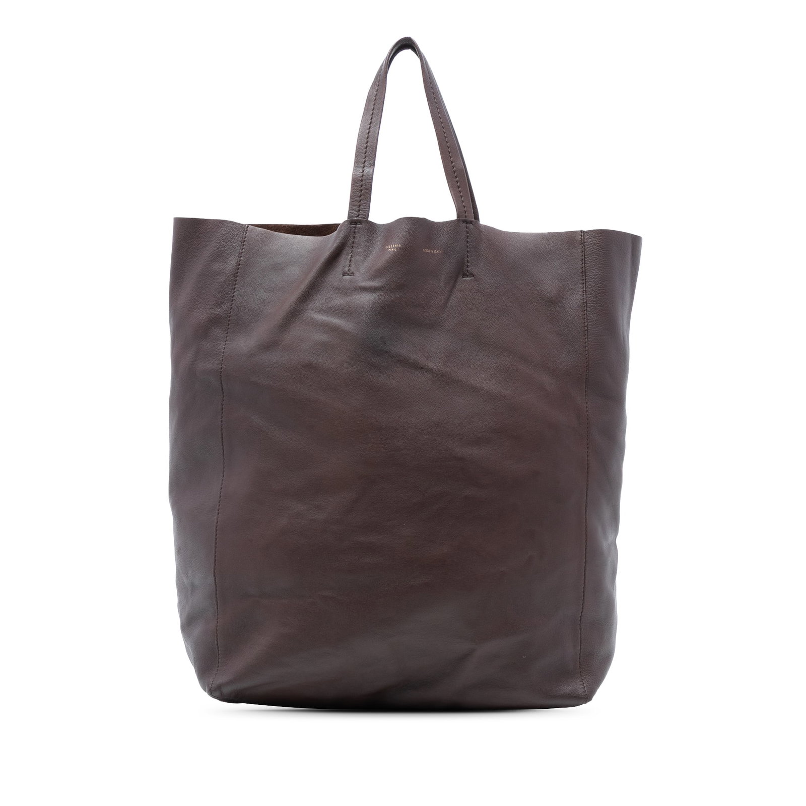 Celine Leather Vertical Cabas Tote Bag in Brown: Celine Leather Vertical Cabas Tote Bag in Brown The Celine Leather Vertical Cabas Tote is a stylish and functional bag crafted from high-quality leather. This tote features flat handles for easy carry